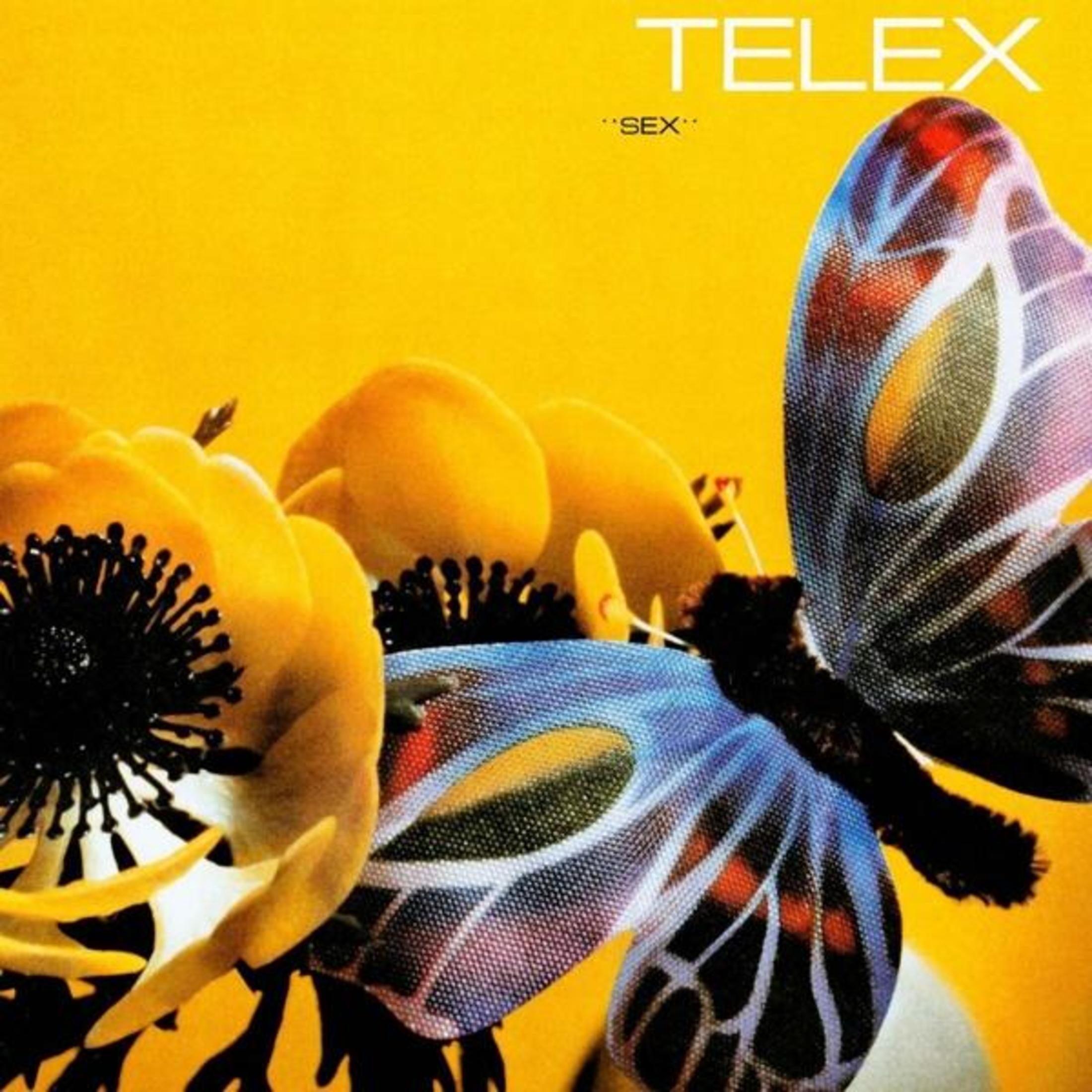 Pochette de l'album : Papillon avec des fleurs jaunes, le titre est 'SEX' de Telex sur fond jaune.