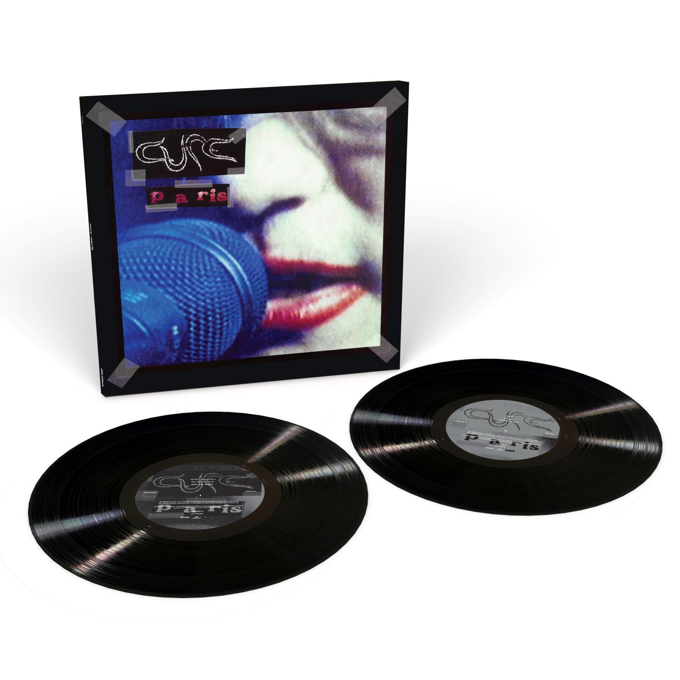 Portada del álbum con una imagen de primer plano de un rostro con labios rojos y dos discos de vinilo negros.