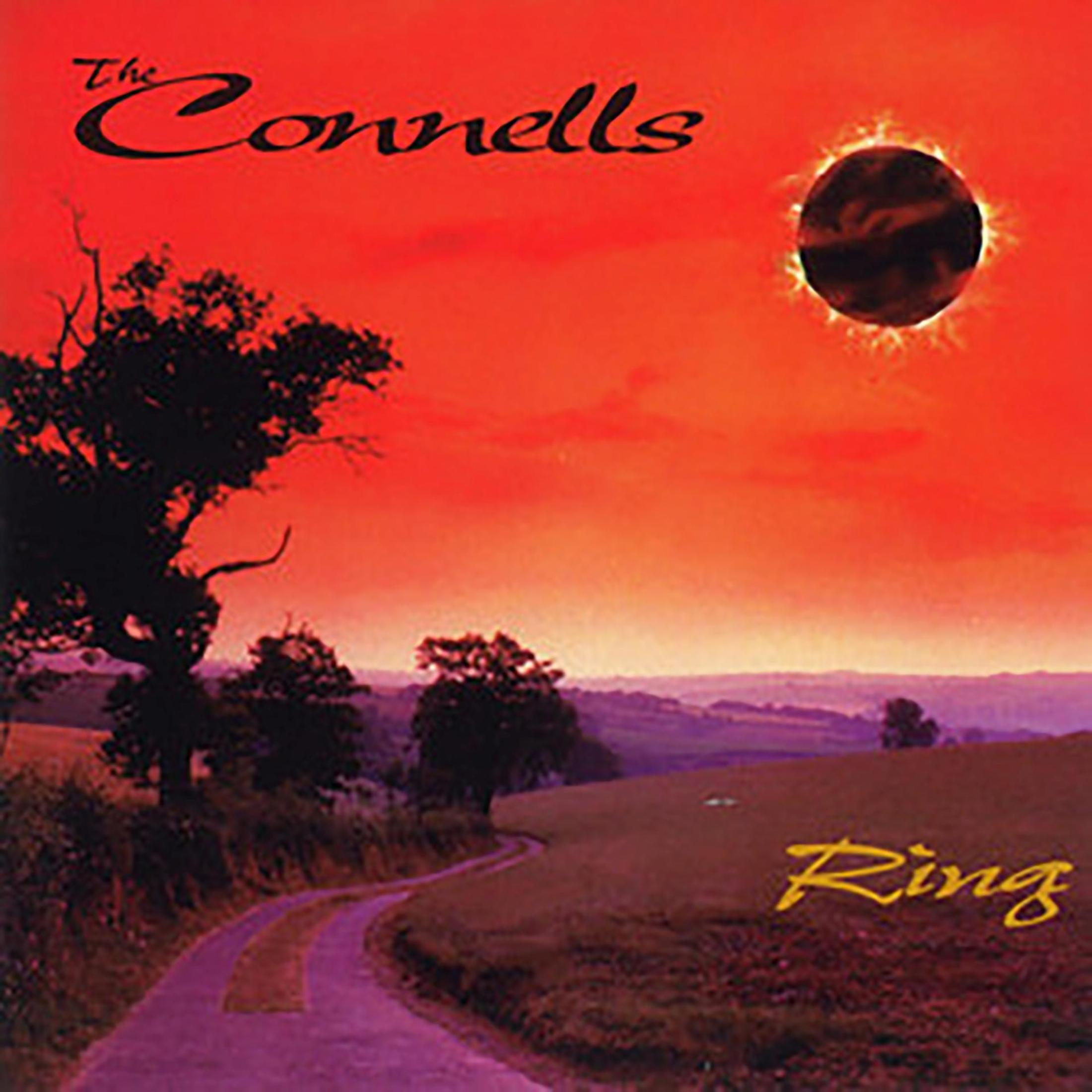 Albumcover: Weg, bomen, zonsondergang, 'Ring' van The Connells, donkere zon.