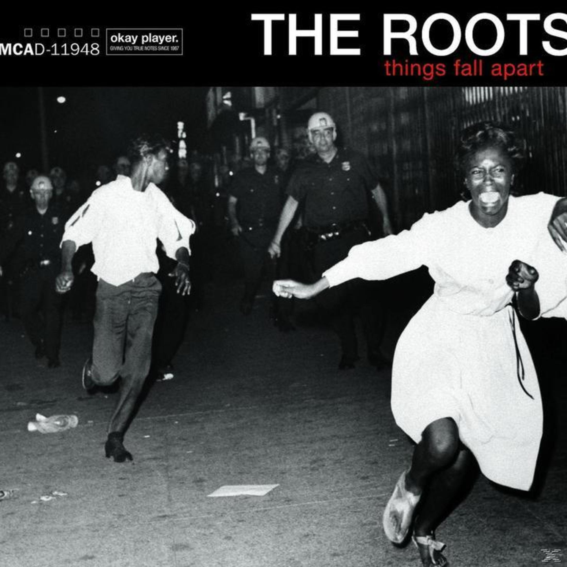 La copertina dell'album dei The Roots mostra una scena di strada caotica con persone che corrono e poliziotti sullo sfondo.