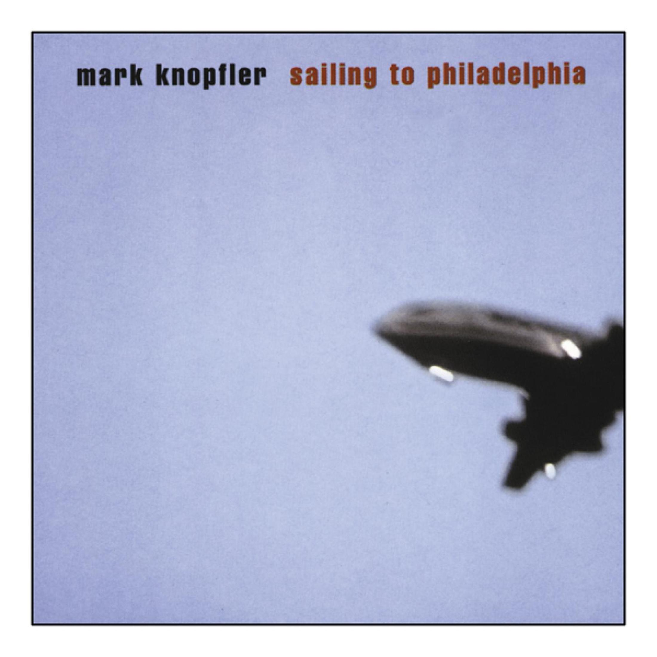 Albumhoes: Vliegtuig in de lucht, titel 'Sailing to Philadelphia' op lichtblauwe achtergrond.