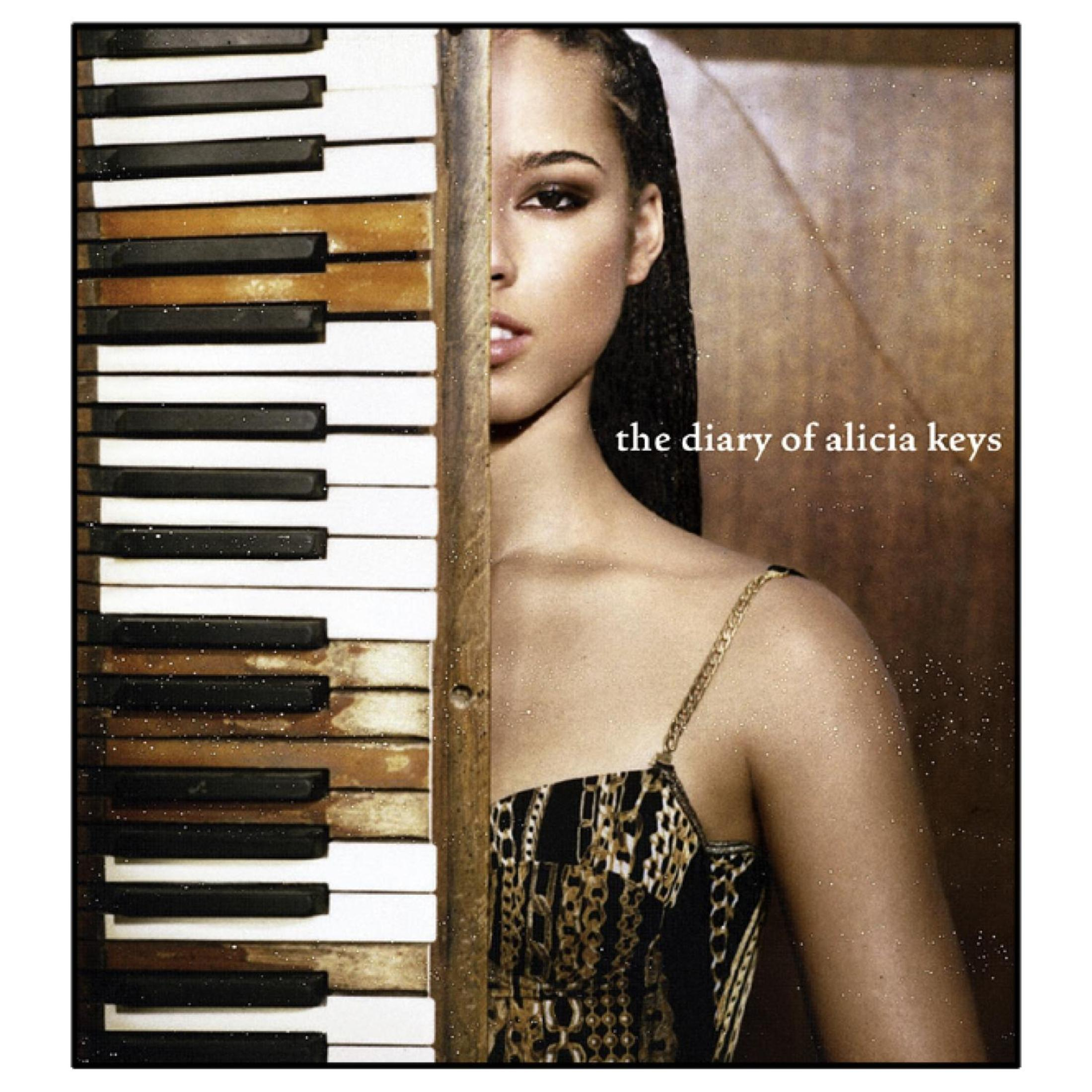 Alicia Keys sur un piano, avec le texte 'the diary of alicia keys'.