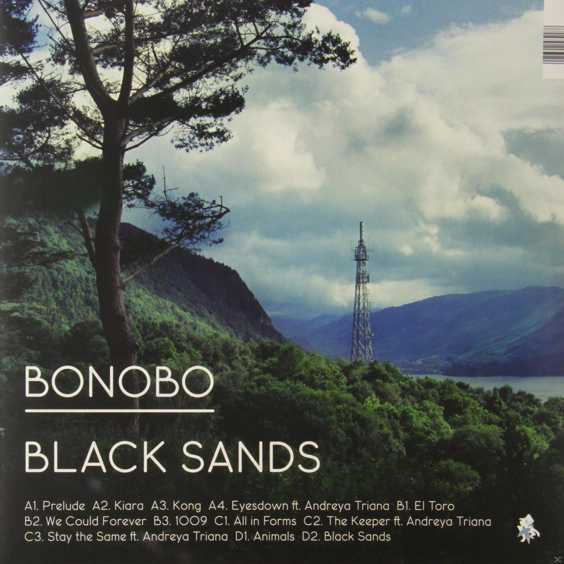 Copertina dell'album con un paesaggio, testo 'BONOBO BLACK SANDS' e scaletta.