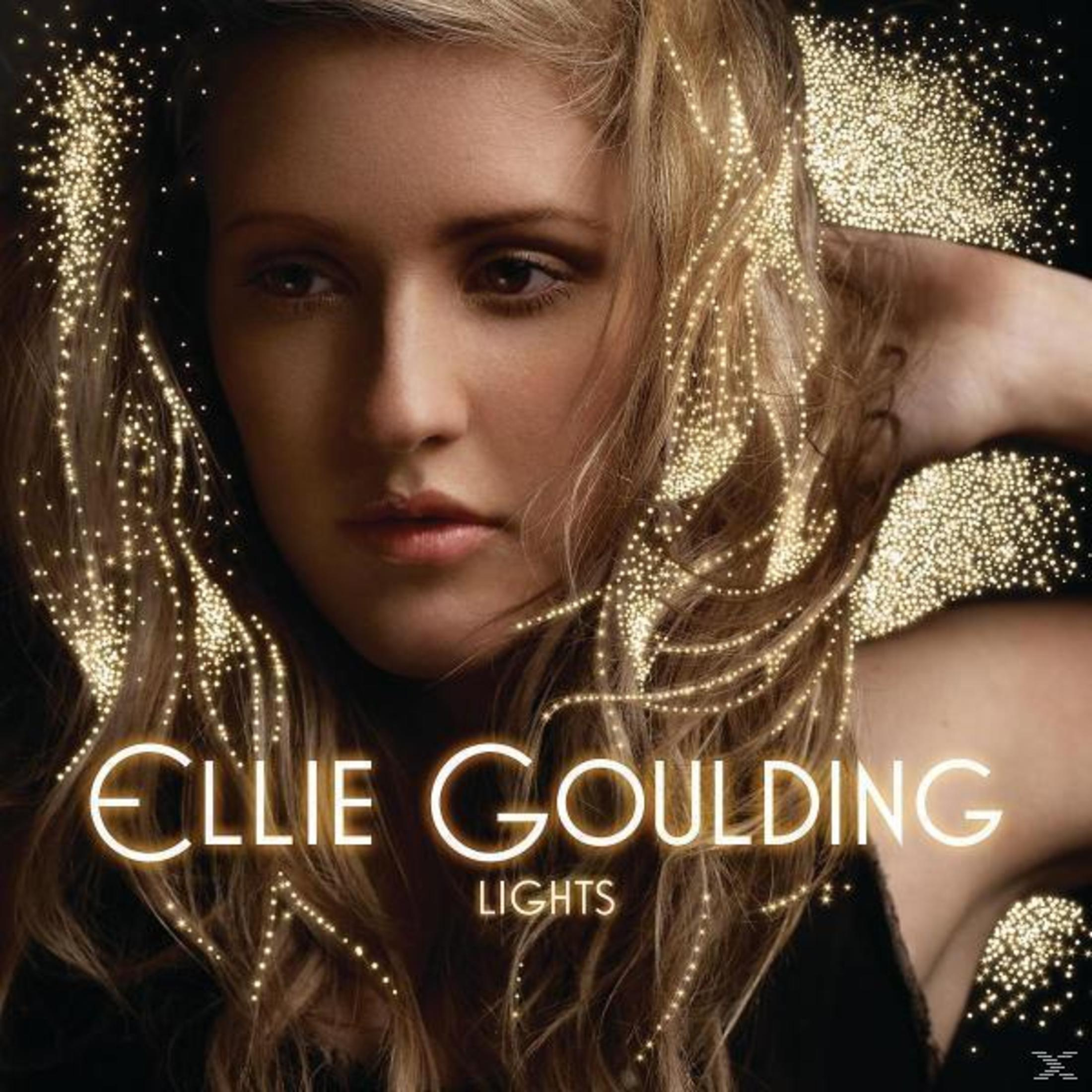 Albumhoes met Ellie Goulding. Blonde vrouw met lichtstrepen, albumtitel onderaan.