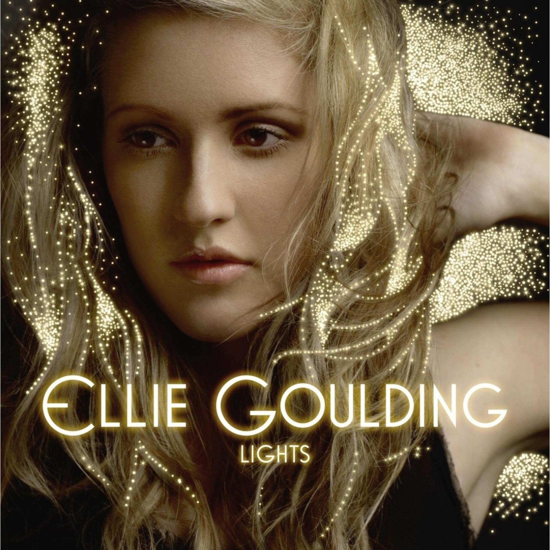 Ellie Goulding, blond haar, neonlichtstrepen, albumhoes.