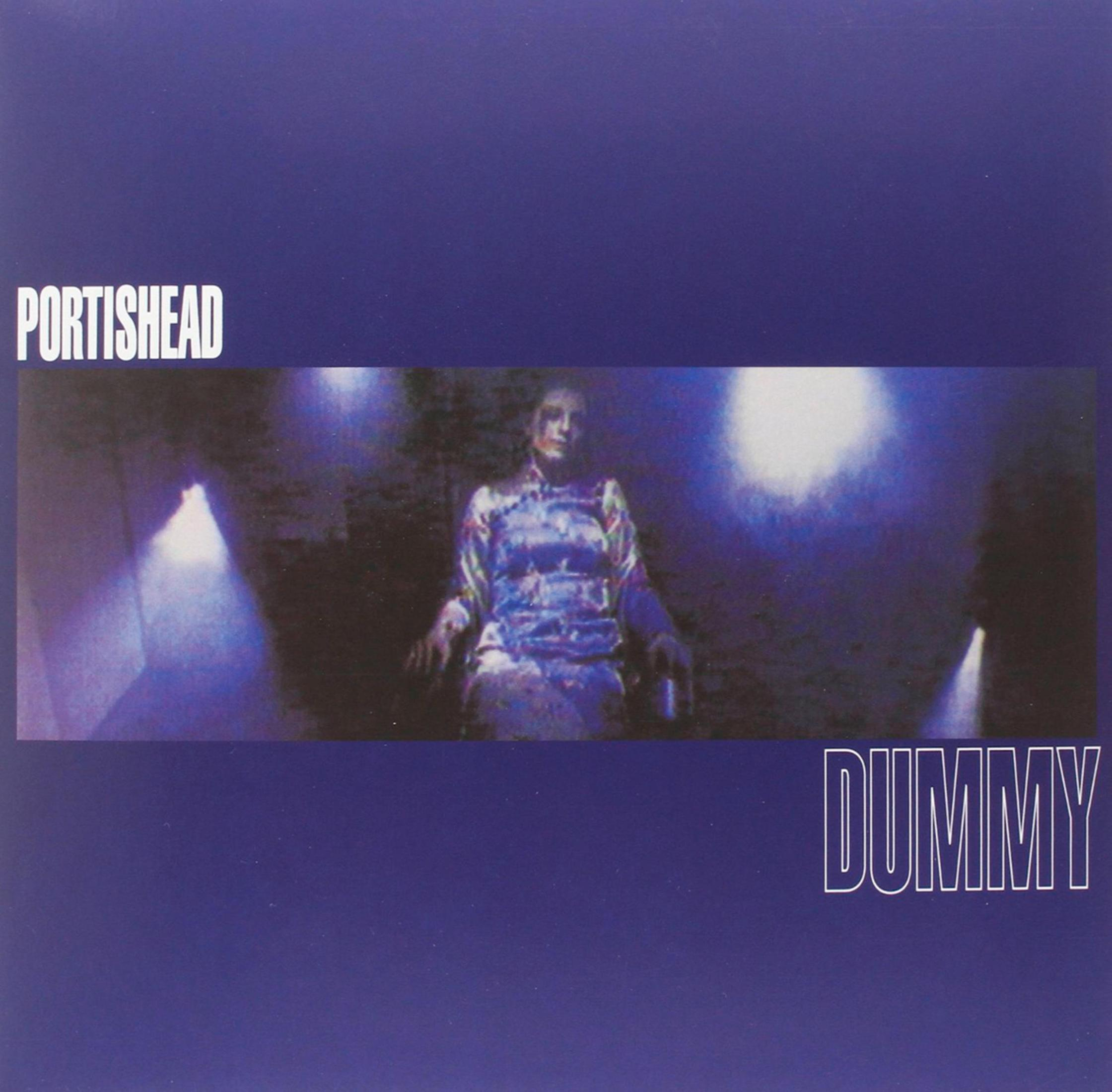 Copertina dell'album dei Portishead: Immagine di una donna su una sedia con sfondo blu. Titolo dell'album e nome della band visibili.