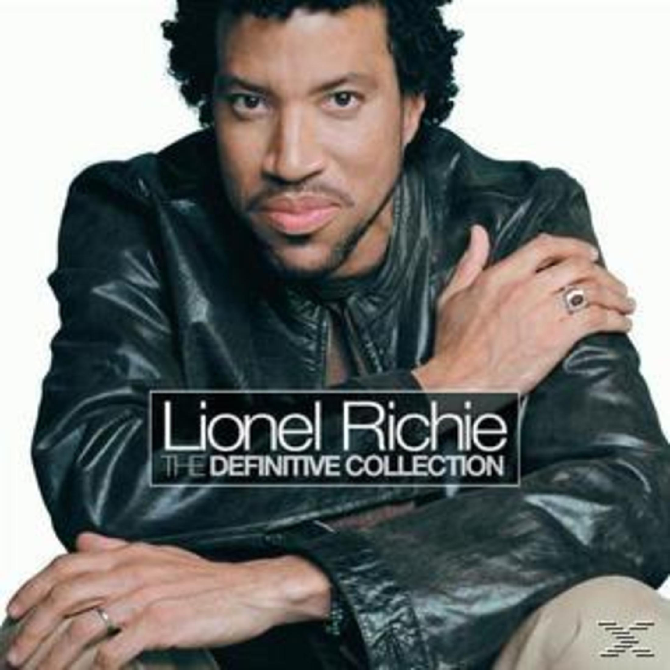 Lionel Richie albumhoes. Hij kijkt vooruit, armen gekruist, draagt een leren jas.
