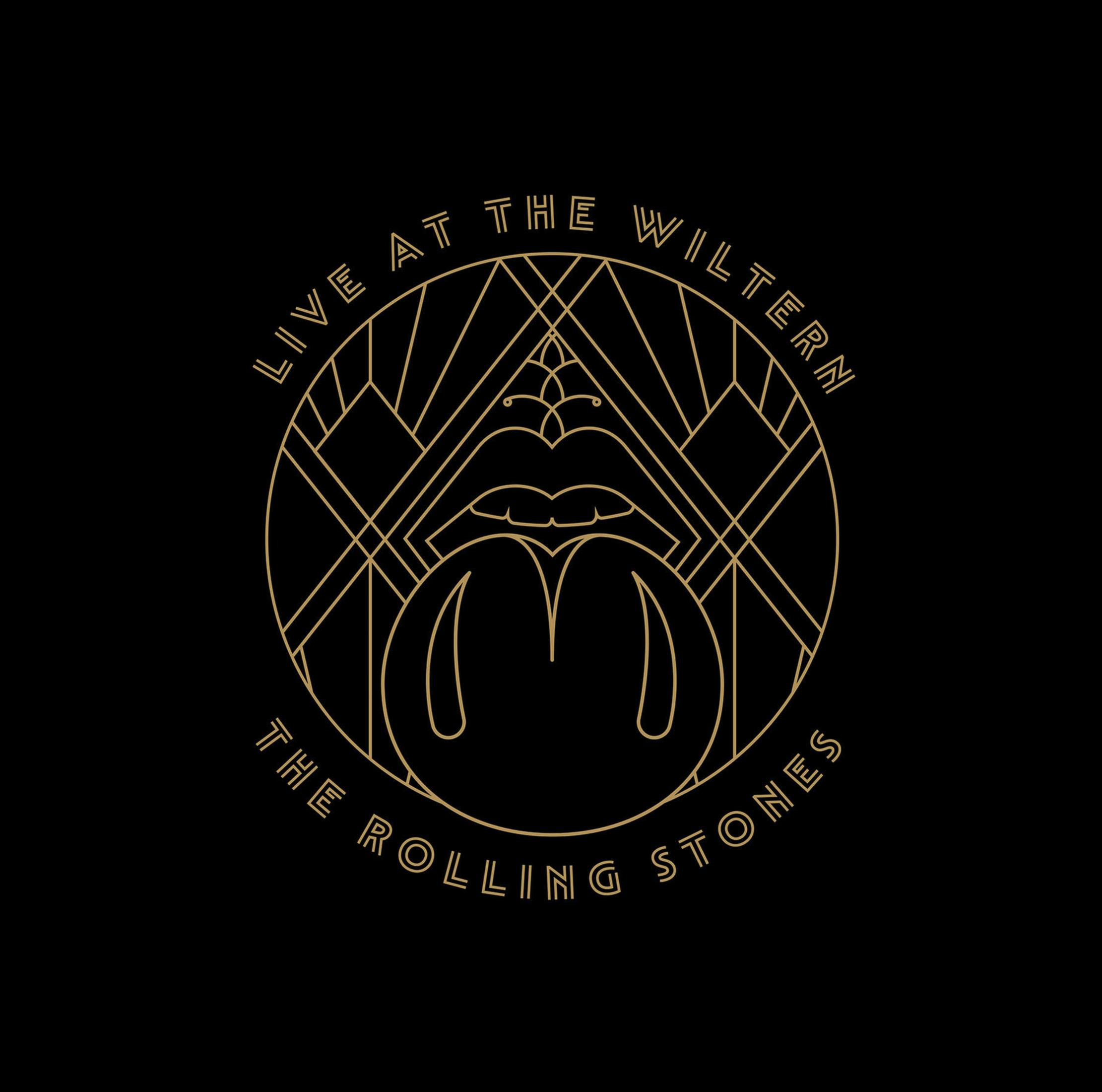 Albumhoes met een Rolling Stones-logo in goud op een zwarte achtergrond. Tekst luidt "Live at the Wiltern".