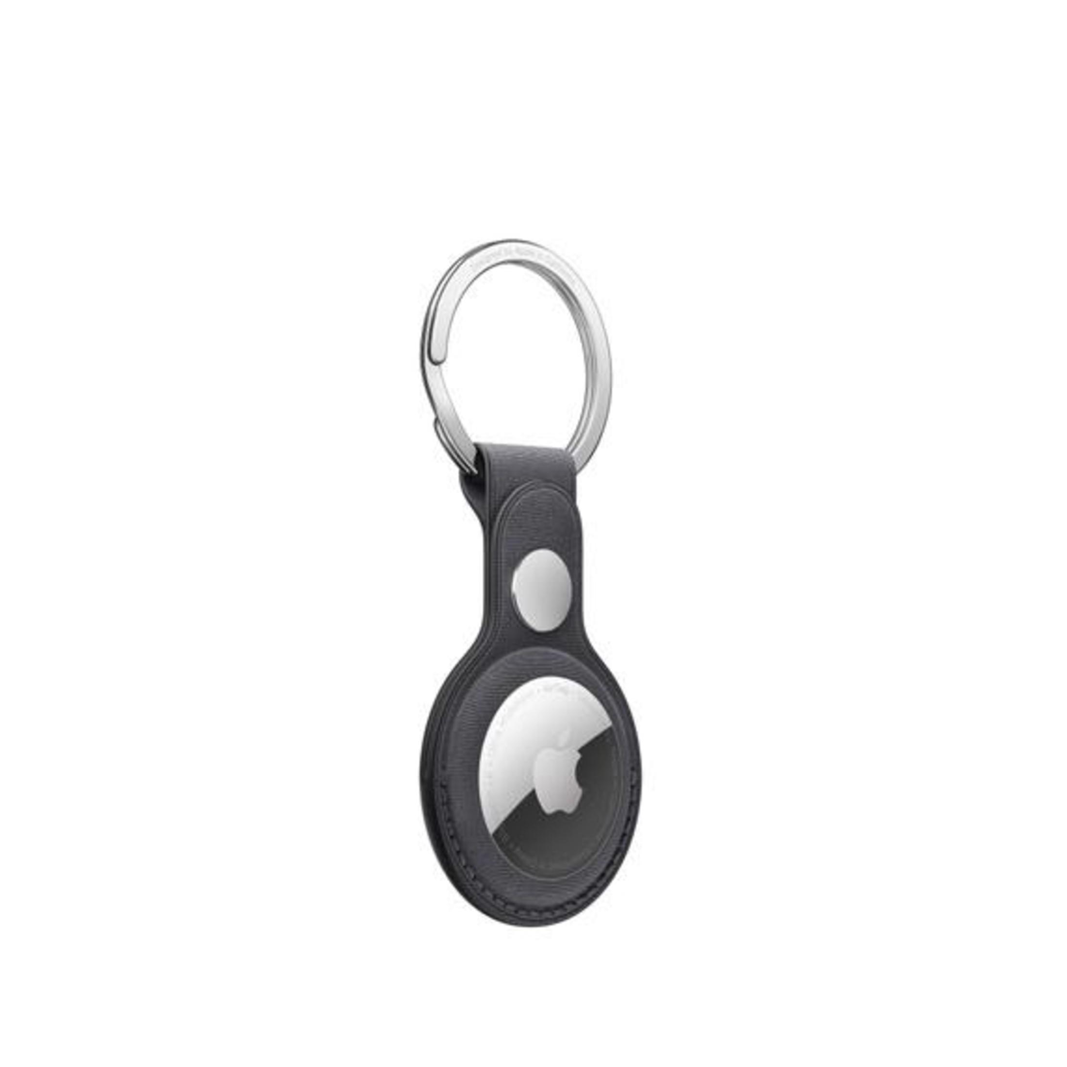 Apple AirTag with a key ring, dark gray leather, and the Apple logo, isolated on white.