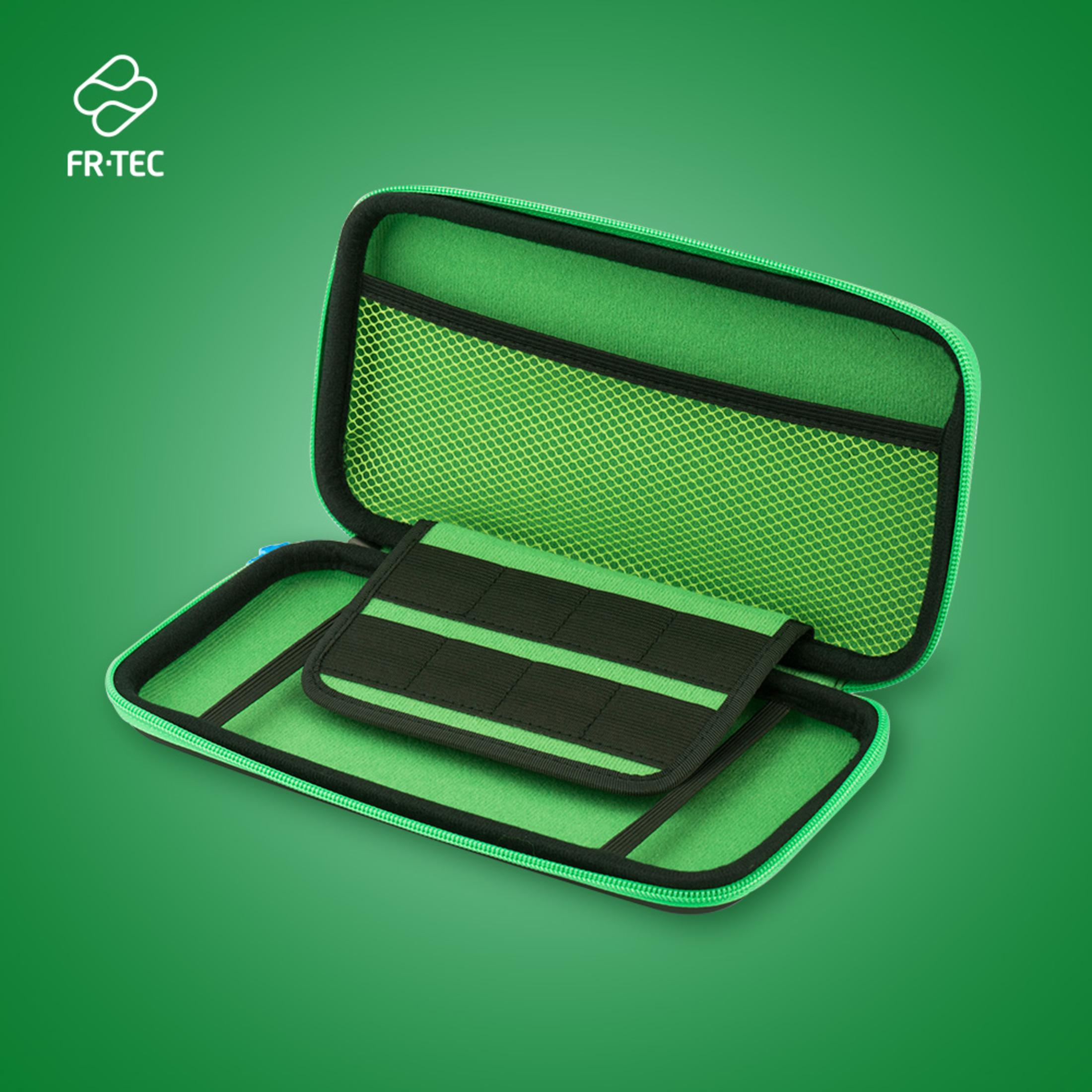 Custodia verde aperta con rete e scomparti neri, piccolo oggetto nero e verde all'interno.
