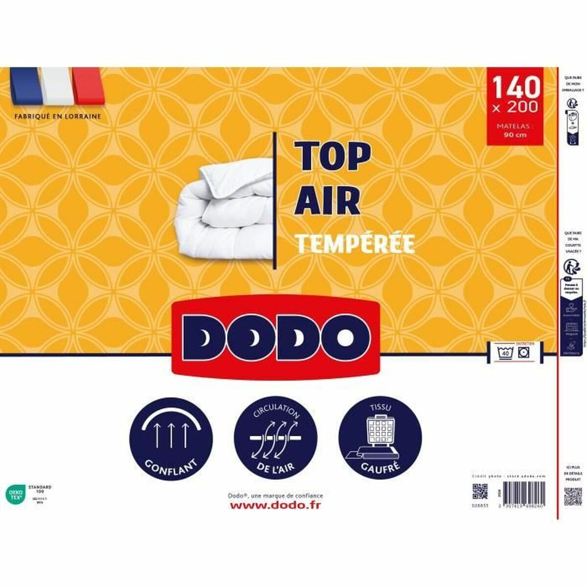 Eine Packung mit einer weißen Bettdecke. Die Verpackung hat Text und Bilder der Bettdecke.