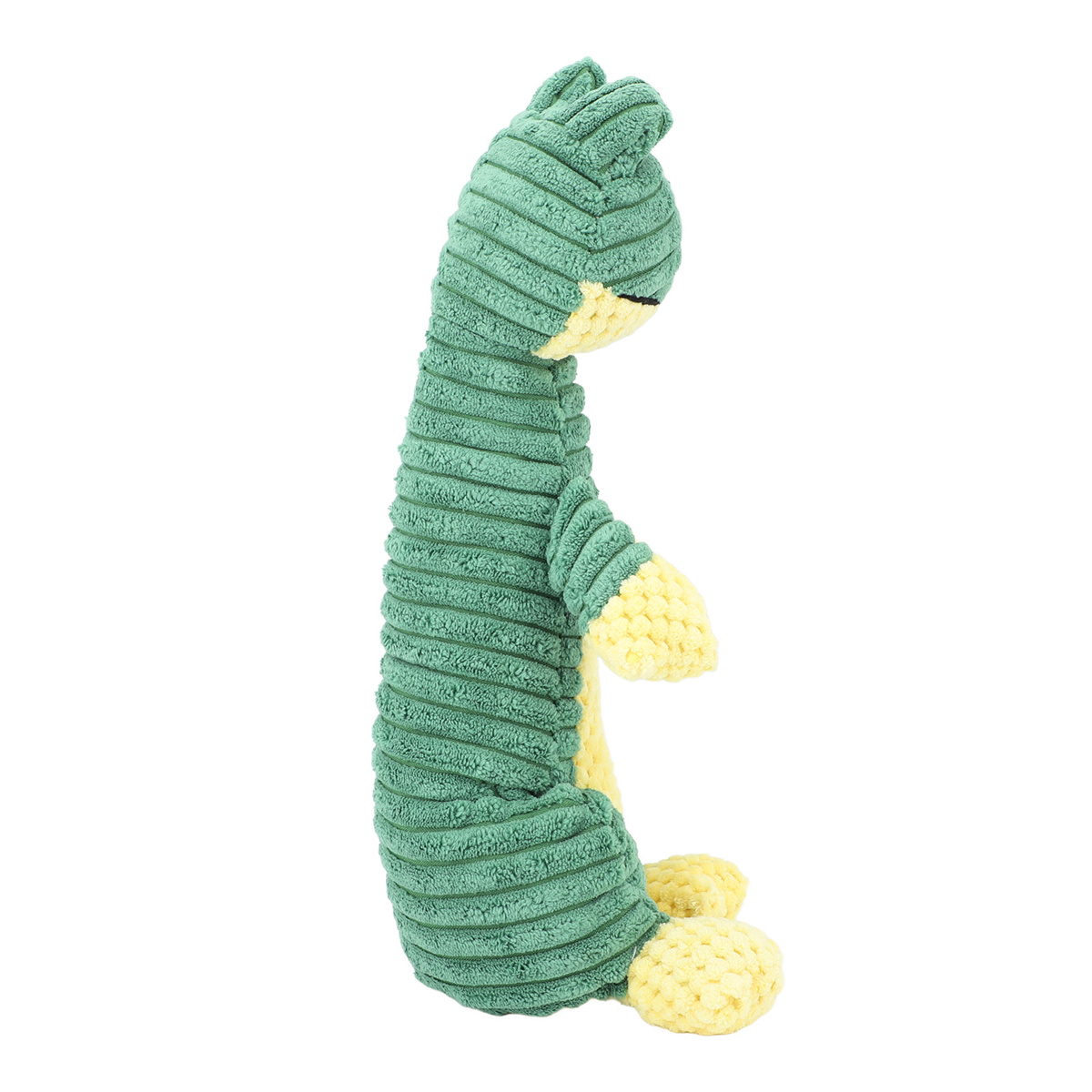 Grünes und gelbes Dinosaurier-Spielzeug. Cord-Textur sichtbar. Seitenprofil.