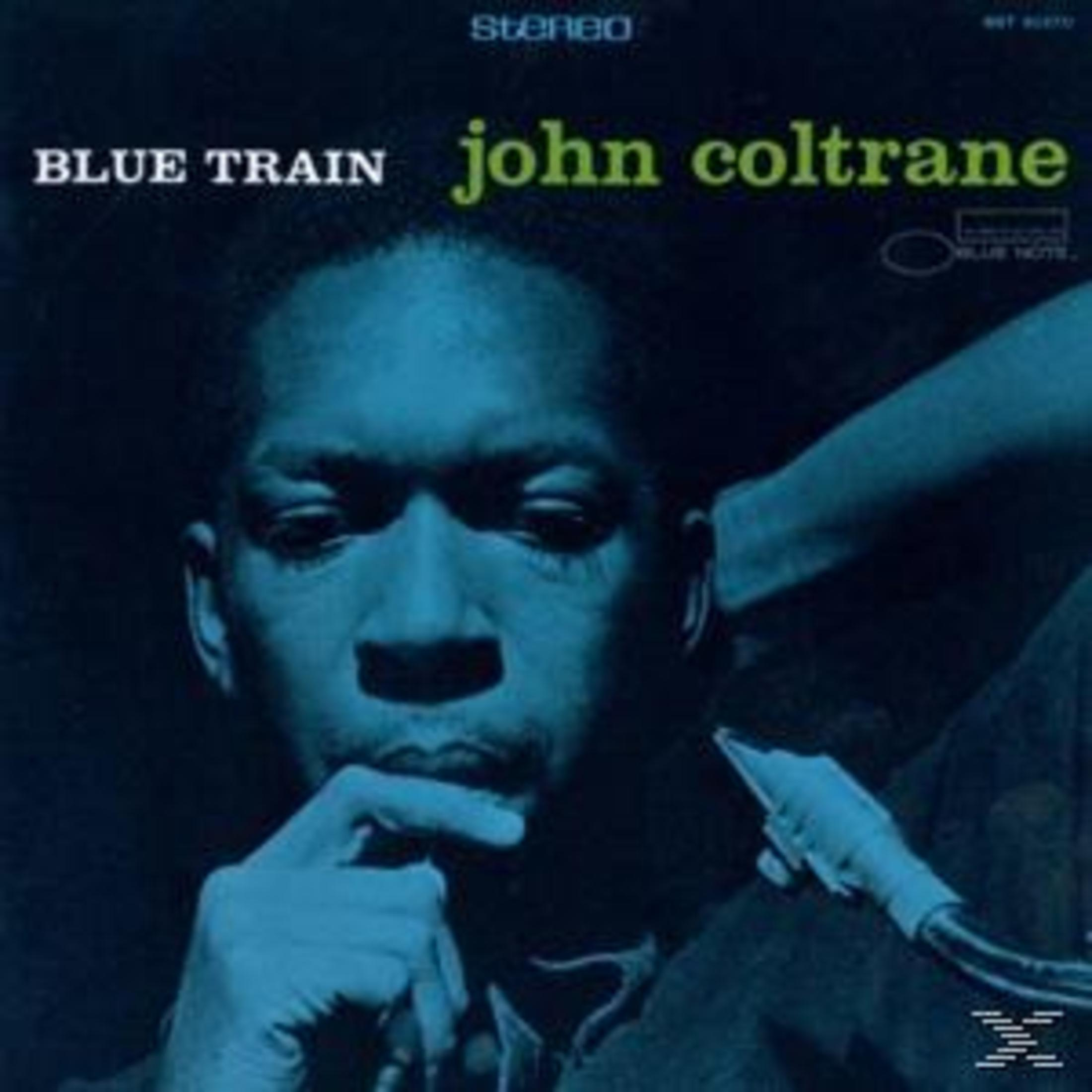 Albumhoes van John Coltrane. Gezicht in blauwe tinten. Titel is Blue Train.