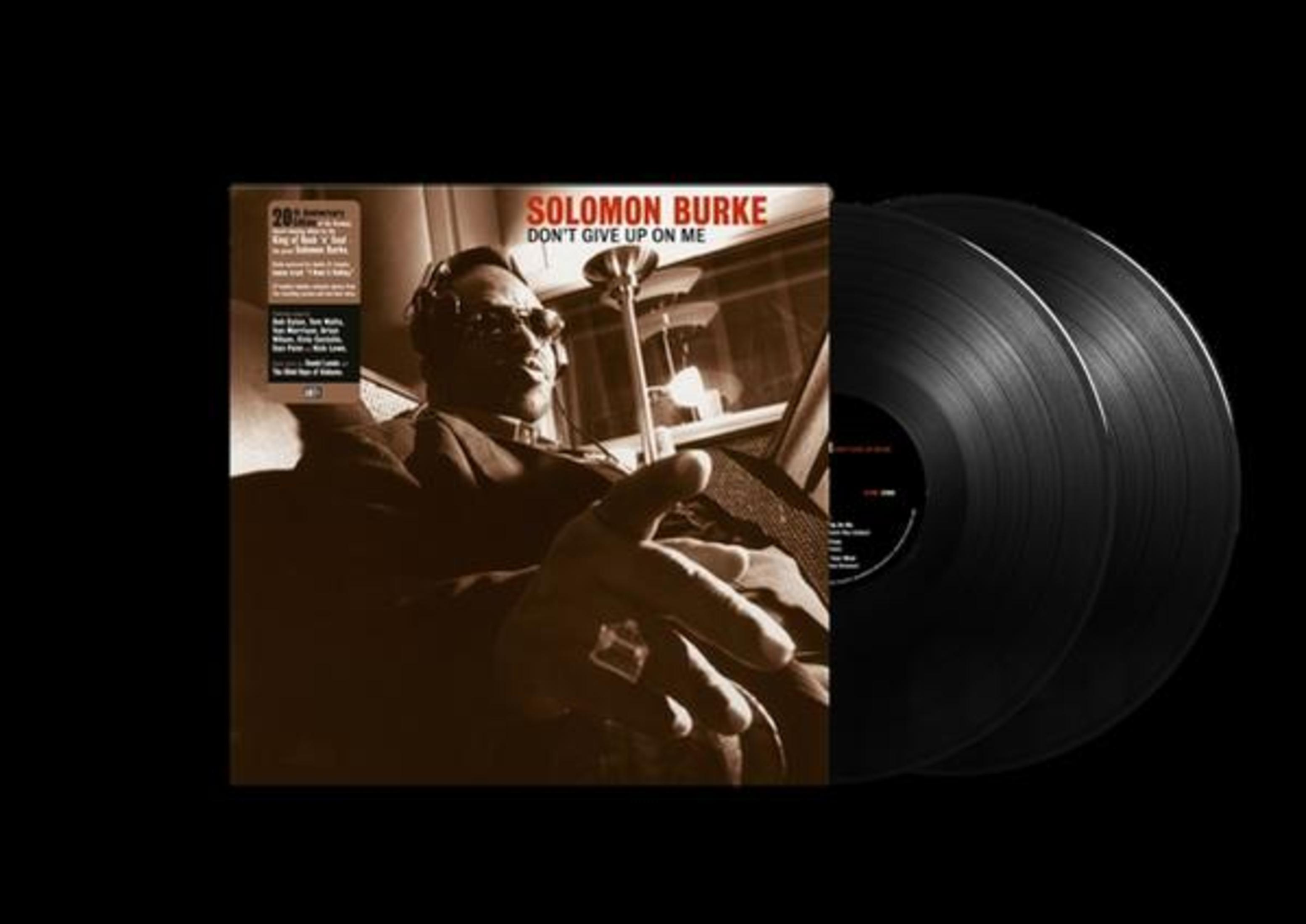 Copertina dell'album con due dischi in vinile e una copertina con un uomo in giacca e cravatta.