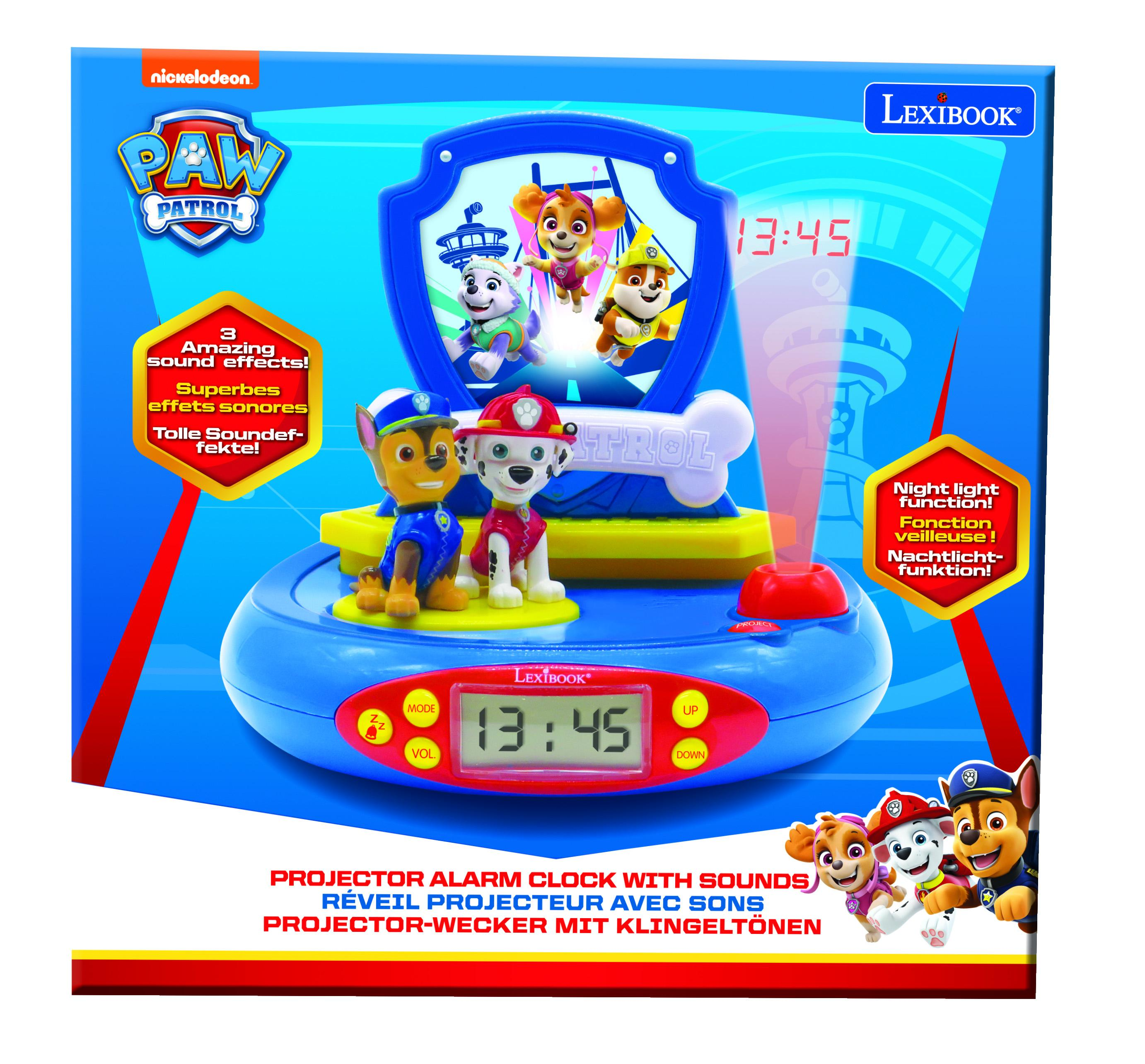 Reloj despertador de la Patrulla Canina. Es azul con personajes y una pantalla digital que muestra la hora.
