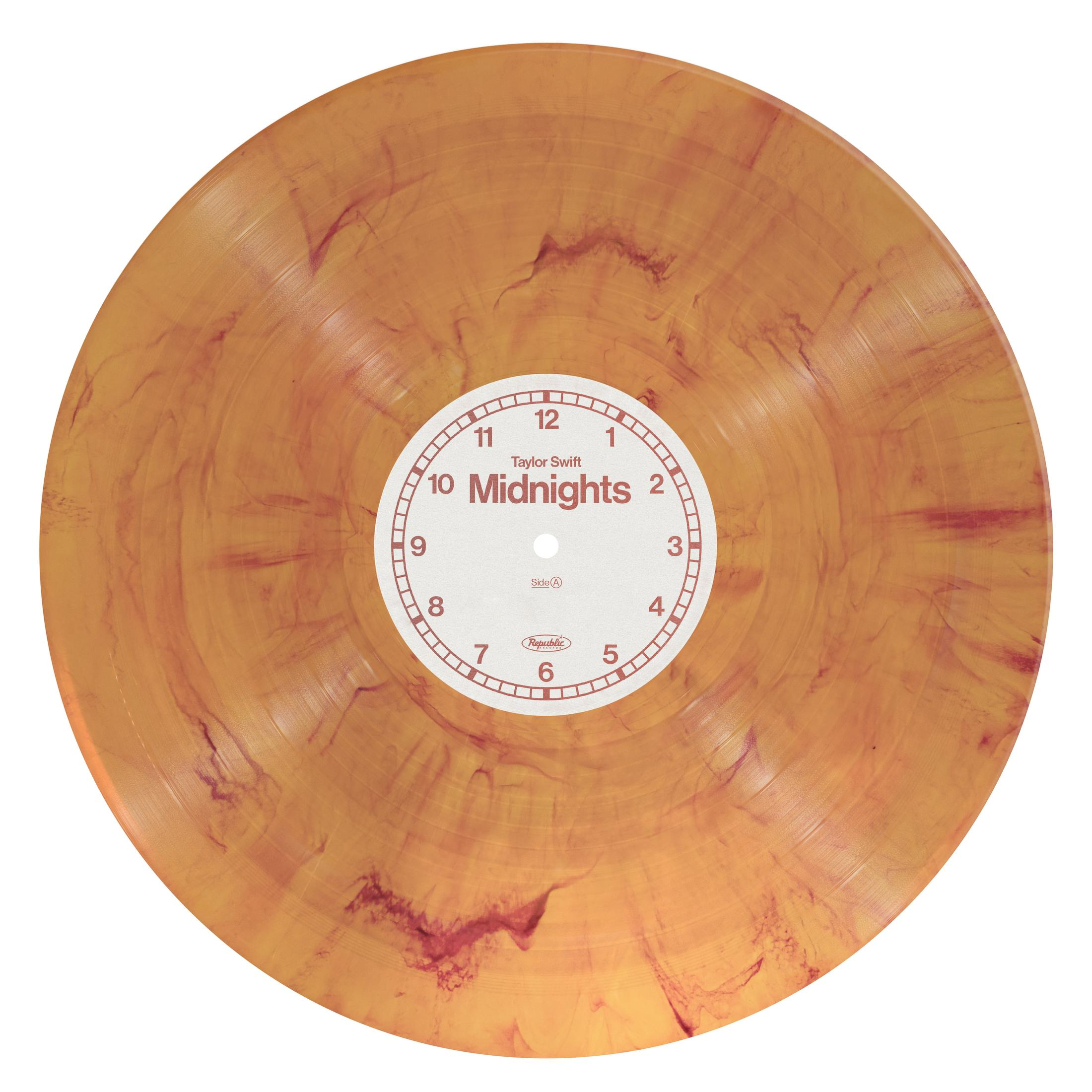 Portada del álbum de Taylor Swift. Disco de vinilo naranja con etiqueta blanca que muestra: Midnights.