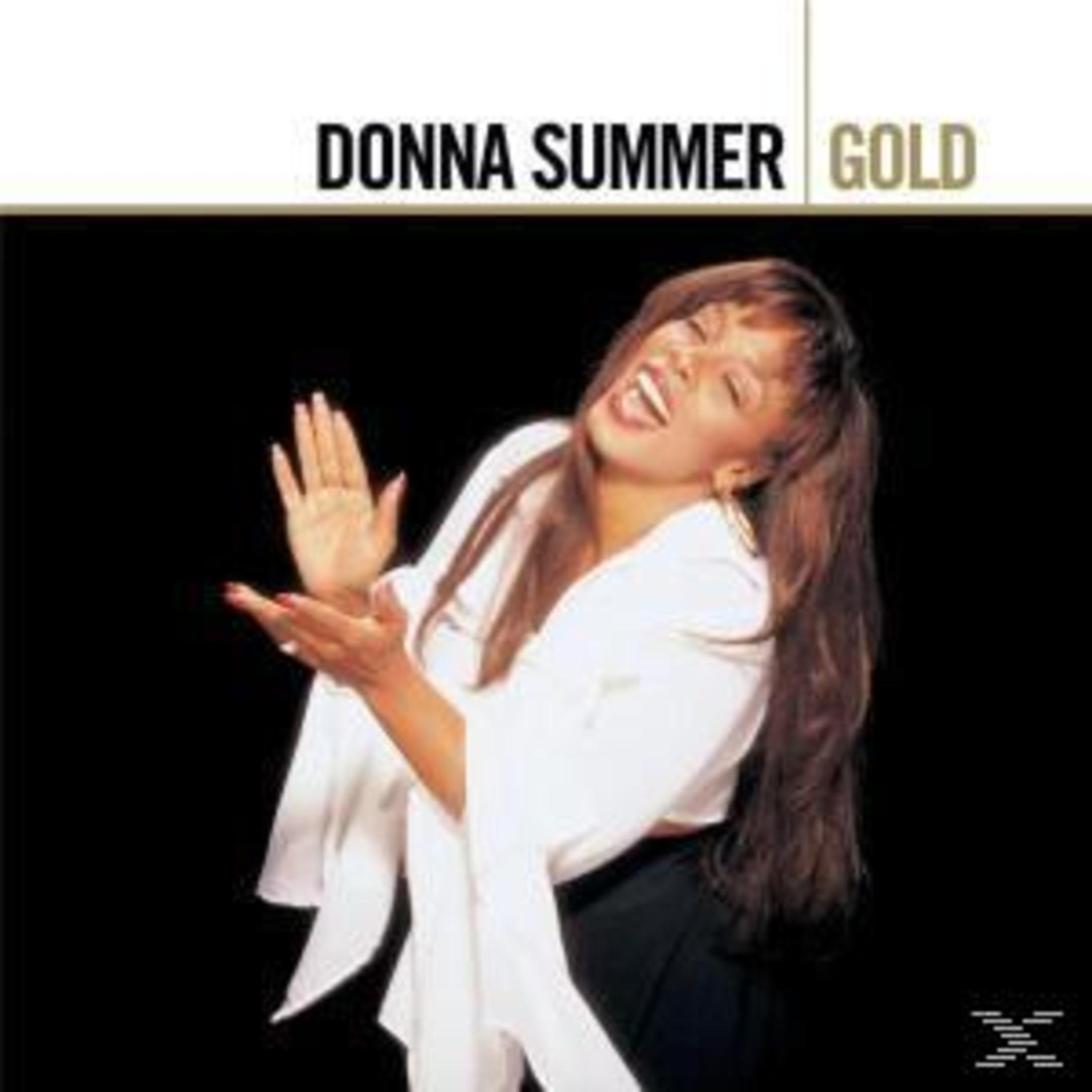 Donna Summer albumhoes. Vrouw lacht, witte top, zwarte rok. Zwarte achtergrond, witte tekst.