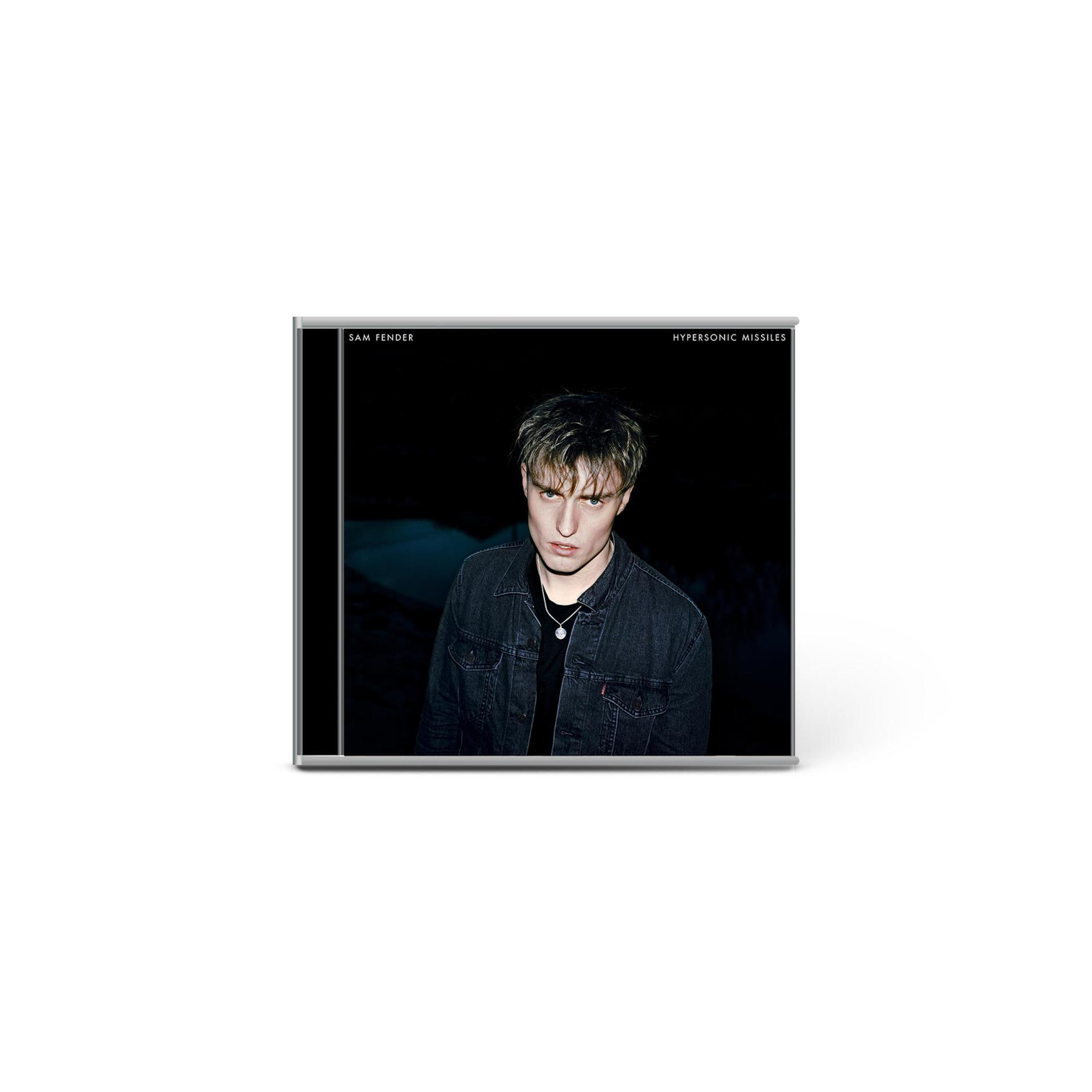 Copertina dell'album: un uomo con una giacca nera che guarda in basso. Sfondo nero.