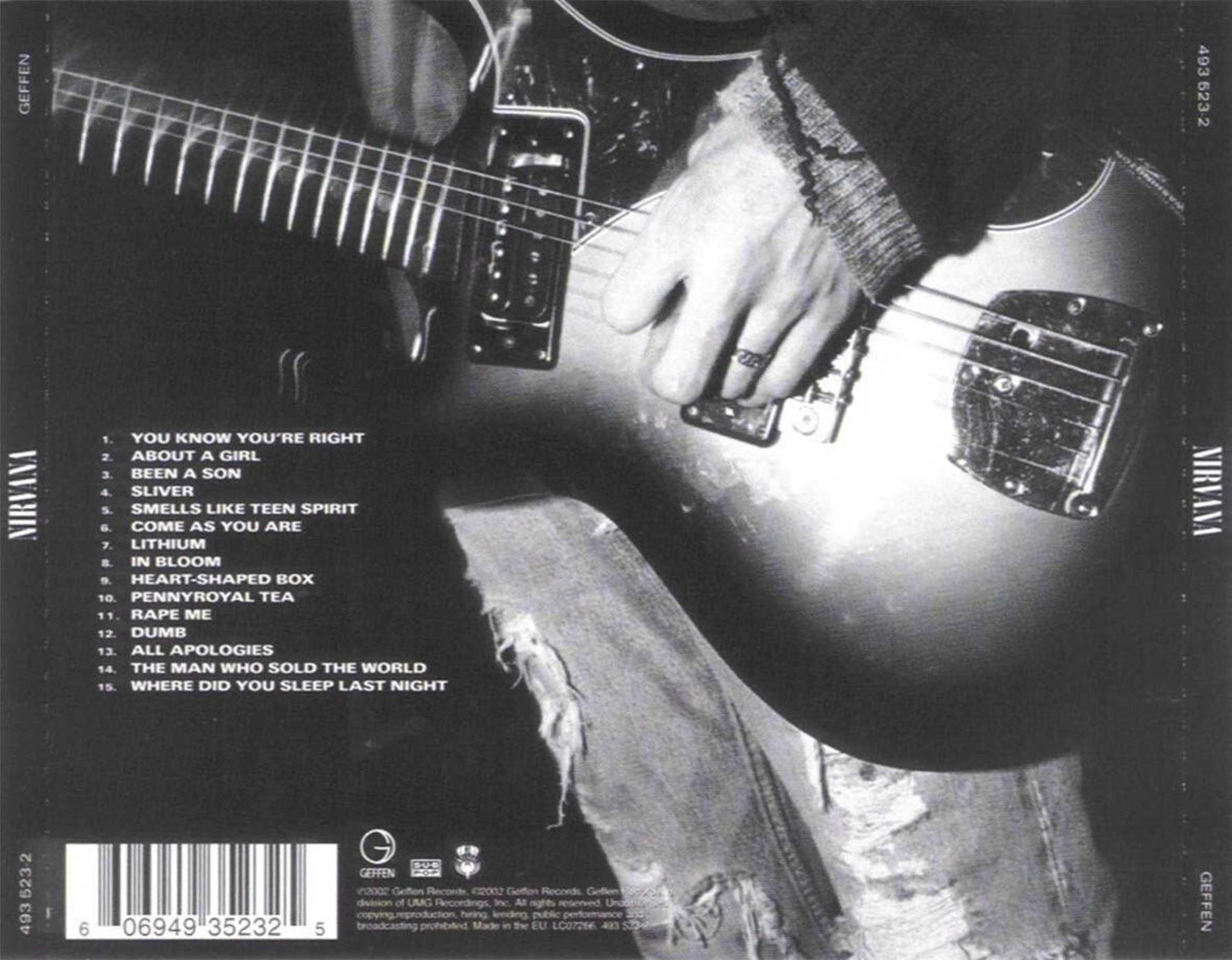 Albumhoes met een persoon die gitaar speelt en een lijst met nummers.