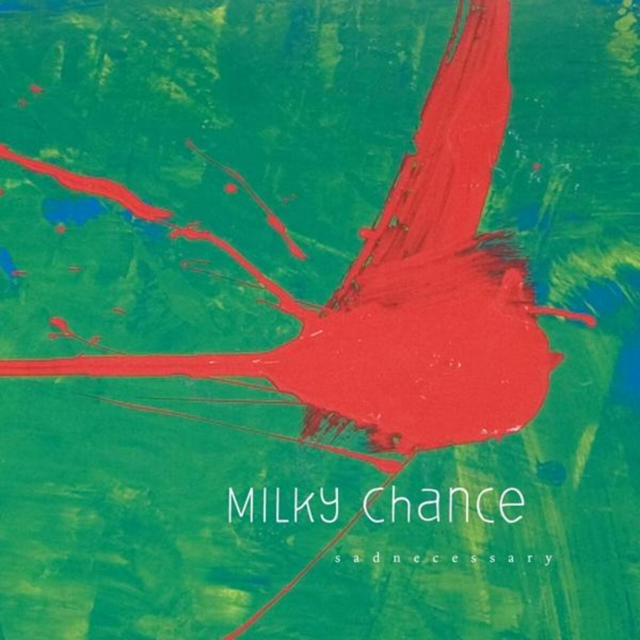 Copertina dell'album, spruzzo rosso su sfondo verde e blu, il testo dice Milky Chance.