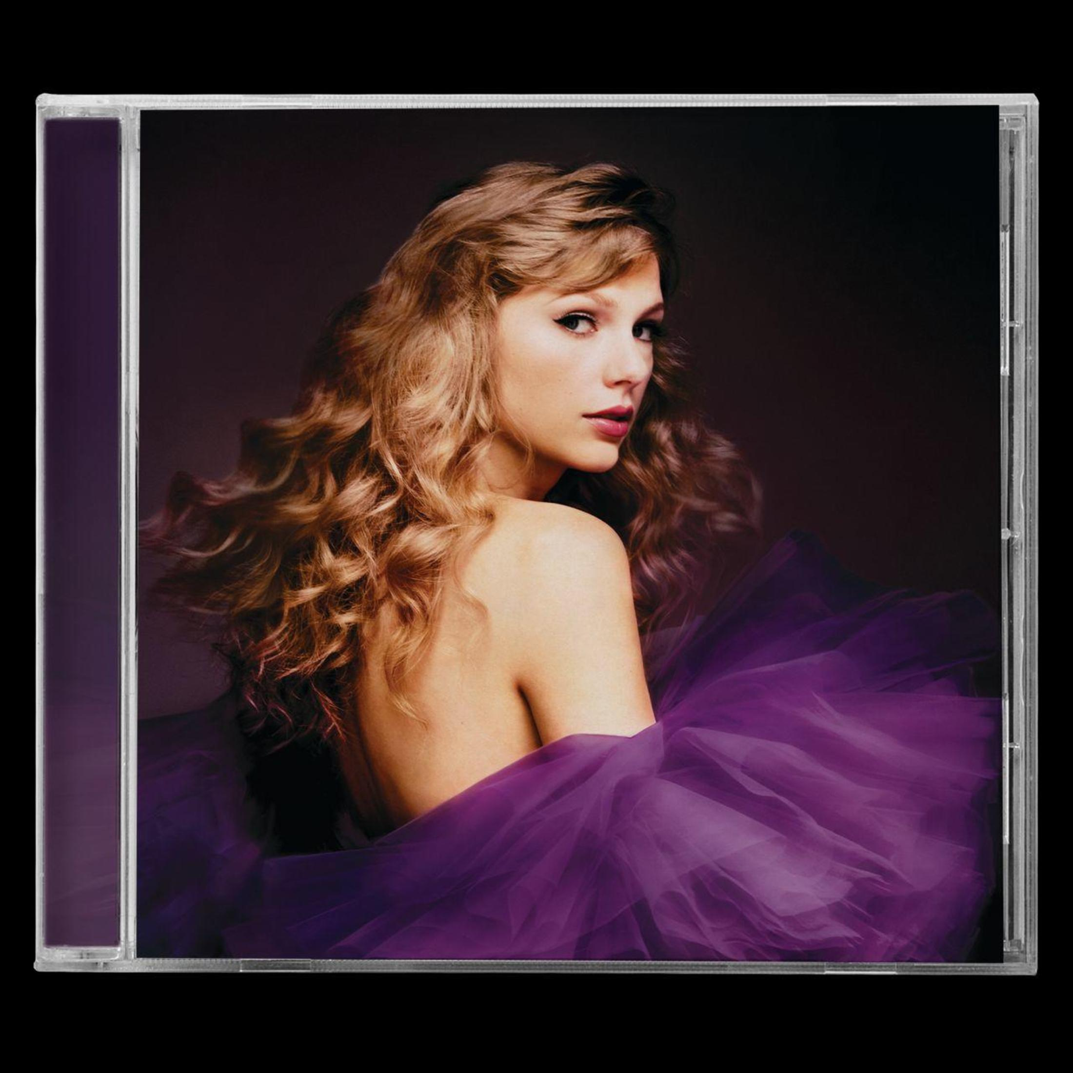 Album cover with a woman in a purple dress. She is looking over her shoulder.