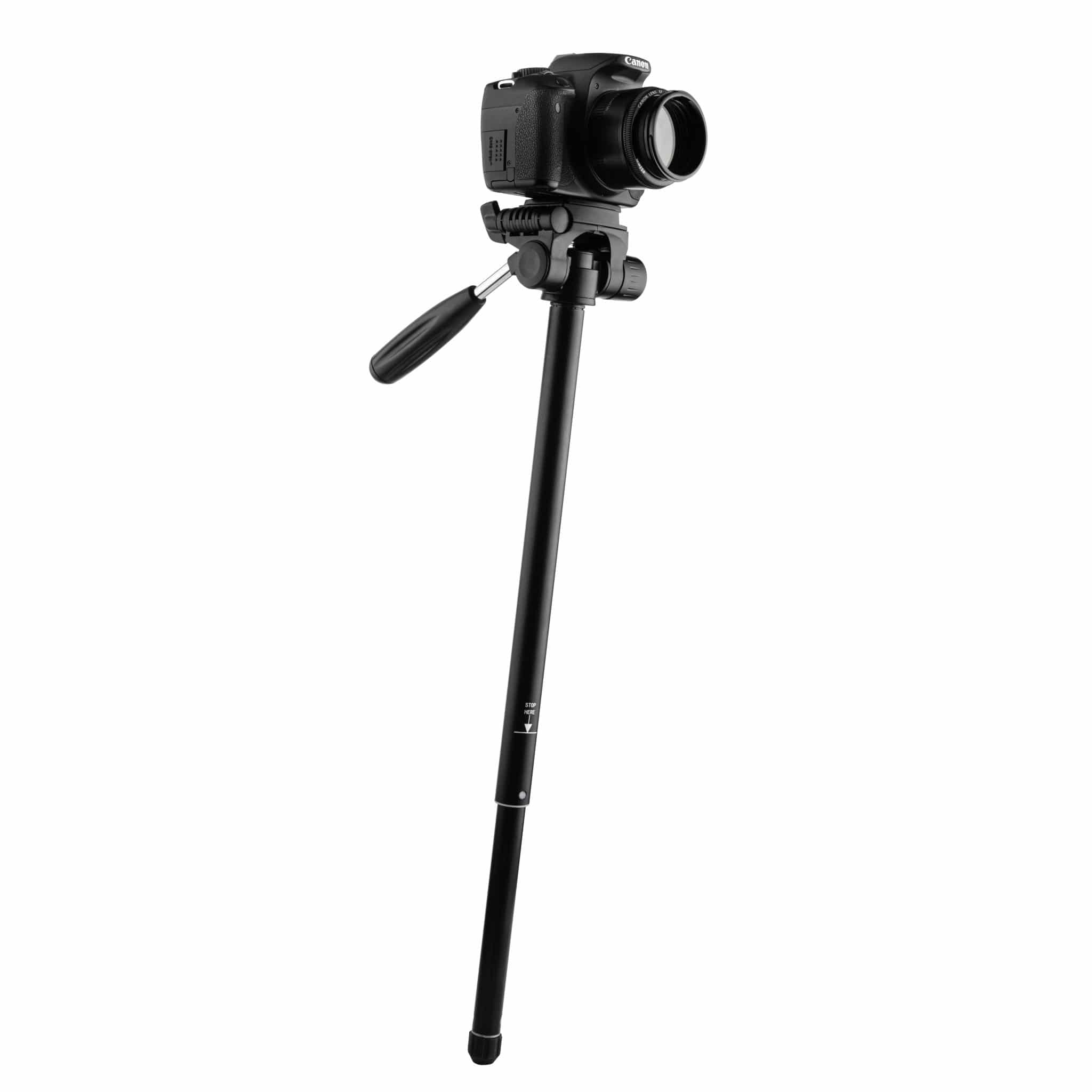 Camera on a black tripod against a white background. The tripod is extended.