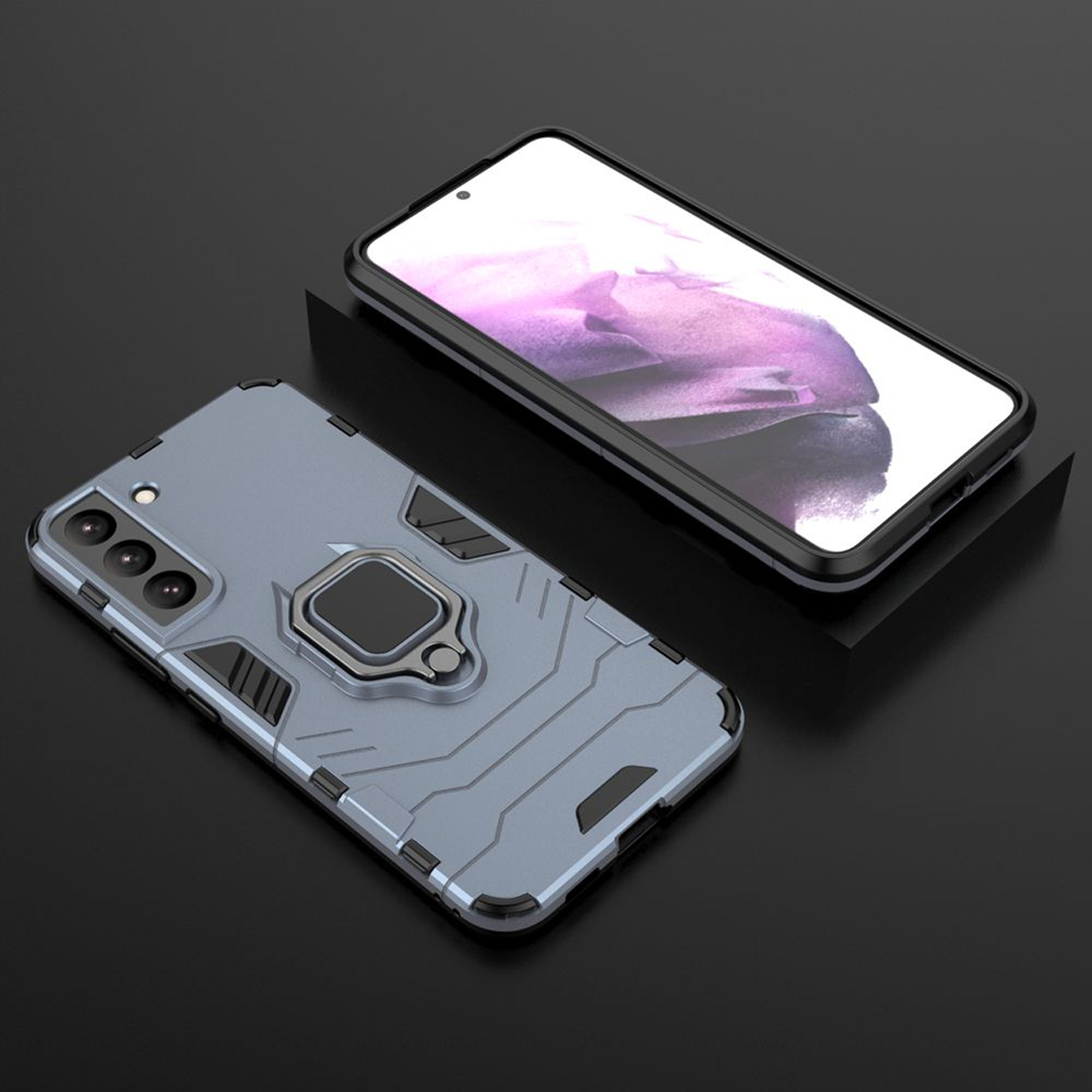 Un étui de téléphone avec un support d'anneau en métal, posé sur une surface noire. Un téléphone est sur l'étui.