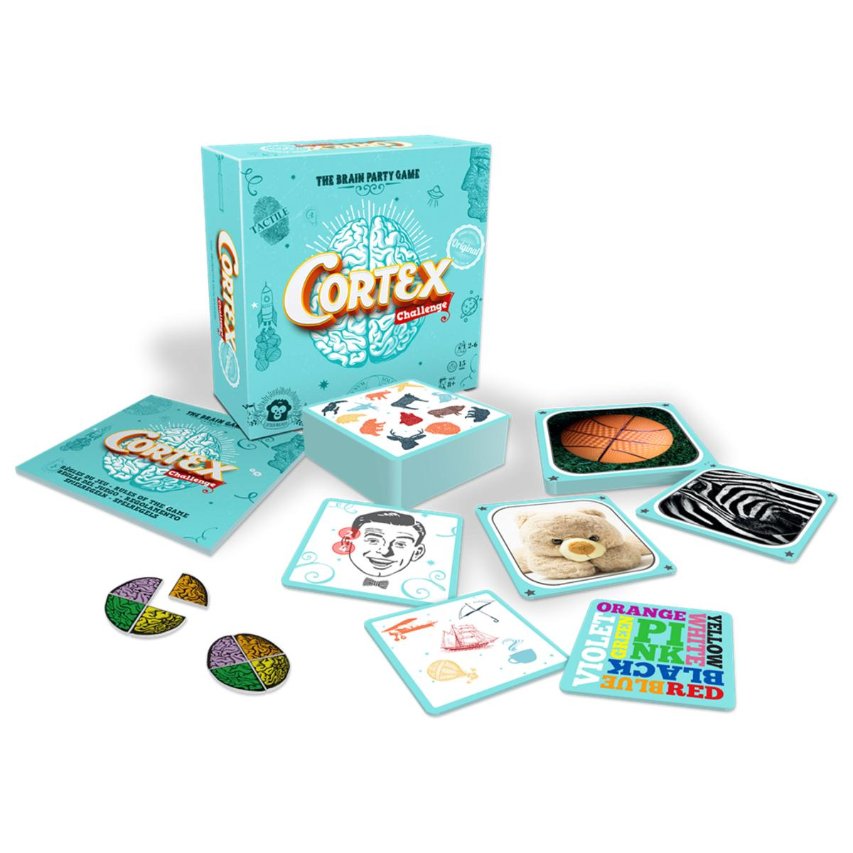 Juego Cortex Challenge. Caja, cartas y fichas. Varias imágenes coloridas en las cartas.