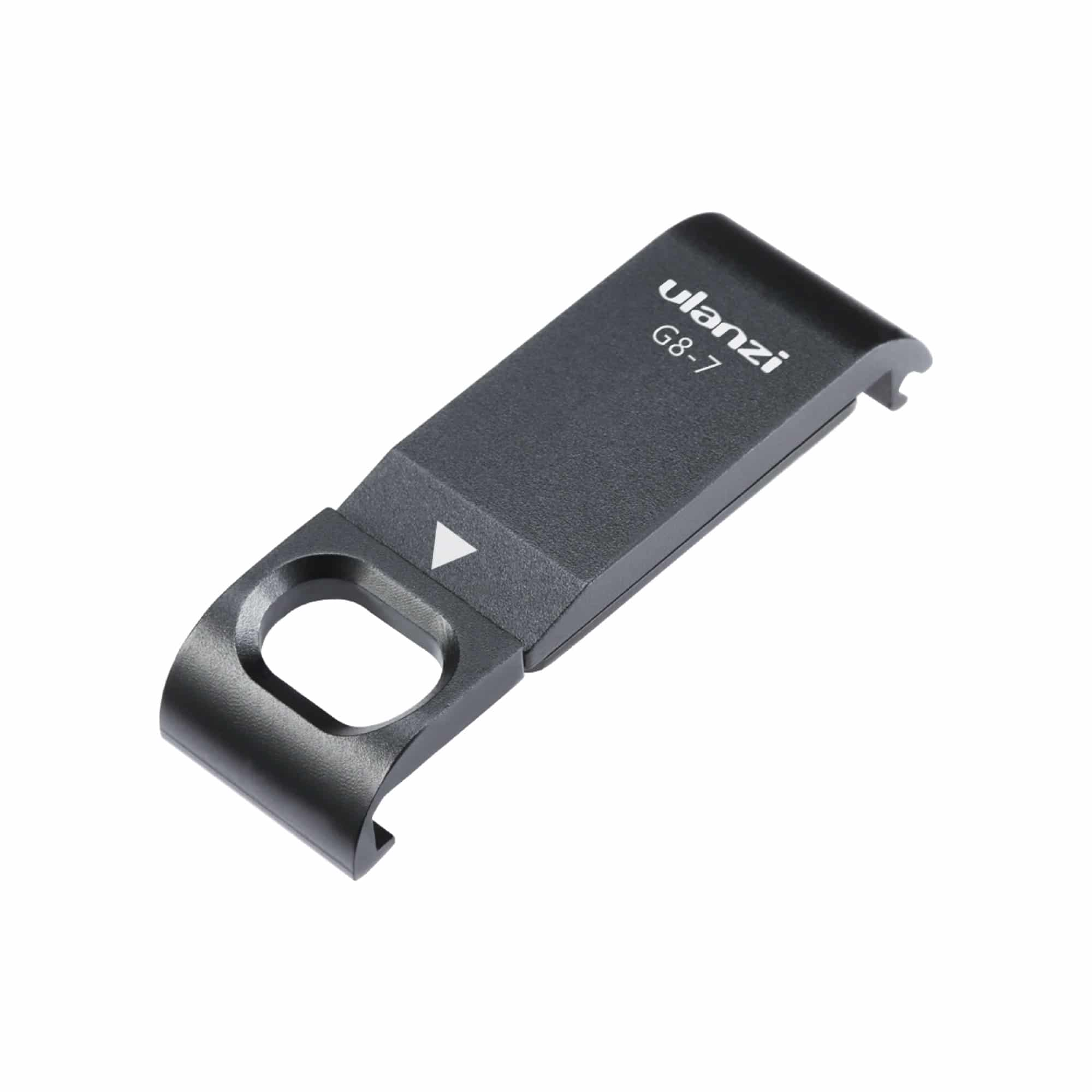 Zwart Ulanzi camera-accessoire met een witte driehoek op een wit oppervlak.