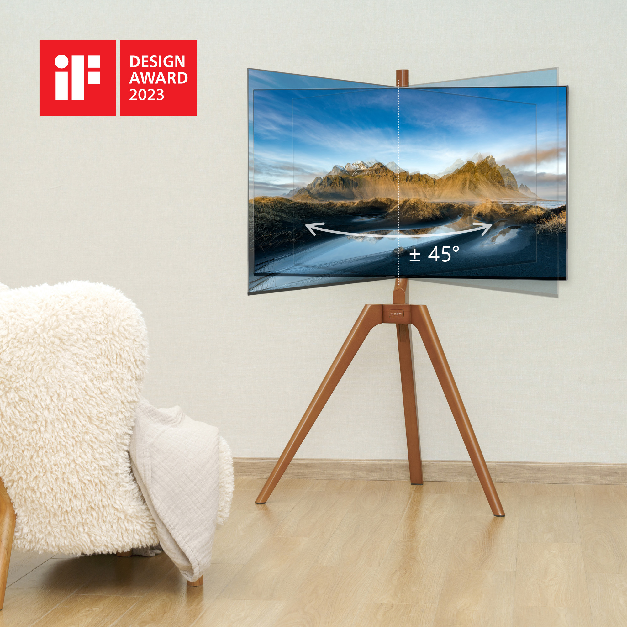 Ein Fernseher auf einem Holzständer mit Drehfunktion. Das Bild zeigt eine Landschaftsansicht auf dem Bildschirm.