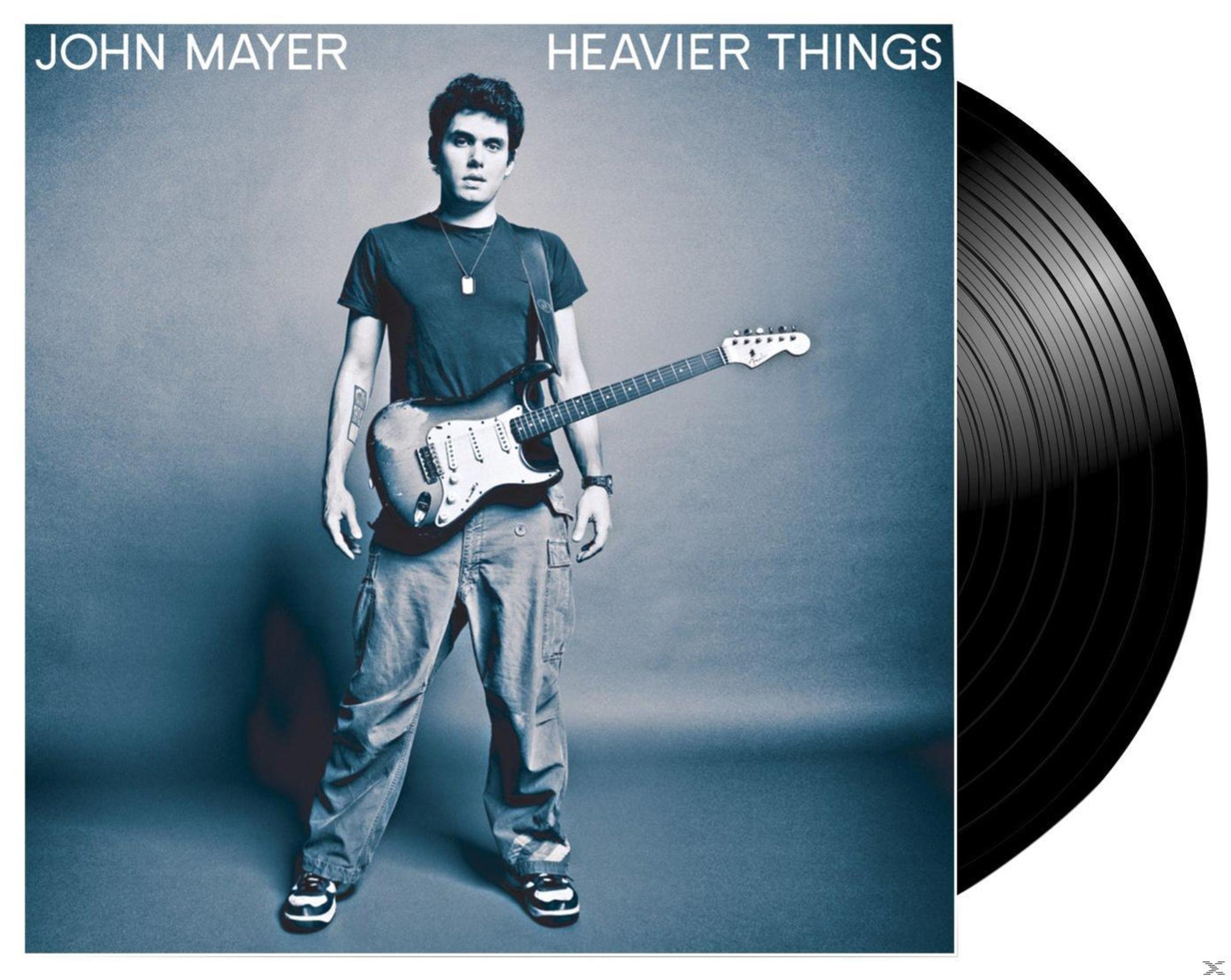 John Mayer with guitar, album cover. Black vinyl record on the right.