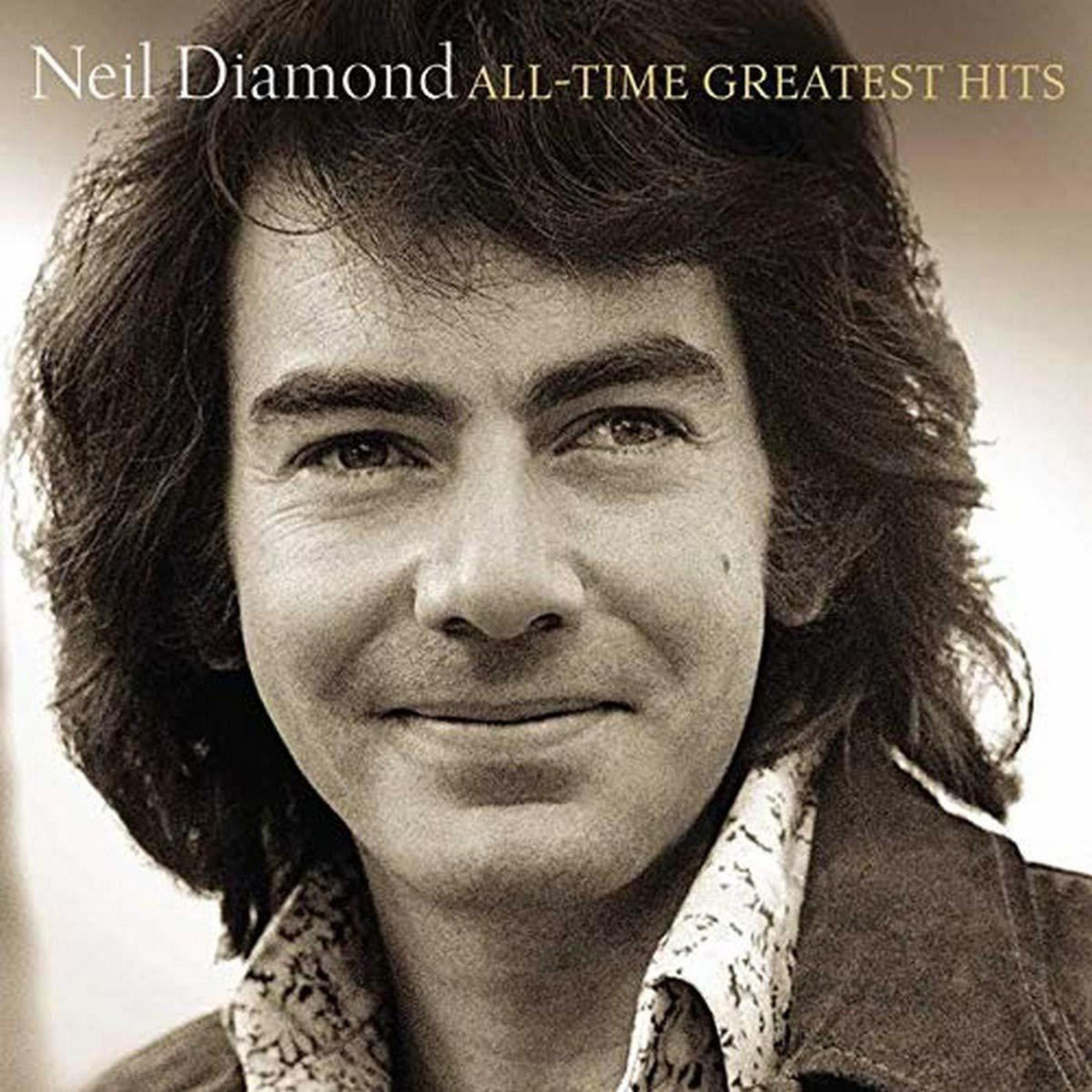 Pochette d'album. Neil Diamond, souriant, cheveux bruns, portant une chemise à motifs et une veste.