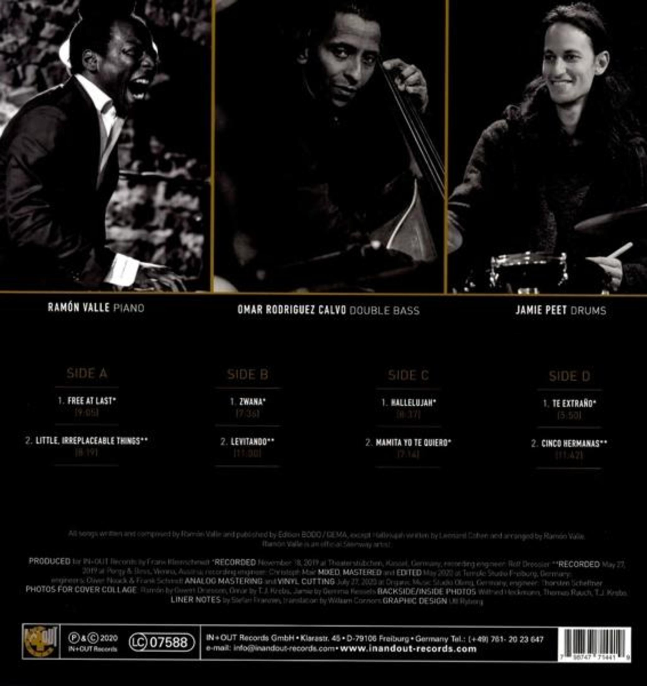 Album cover with three musicians' faces and song titles. 