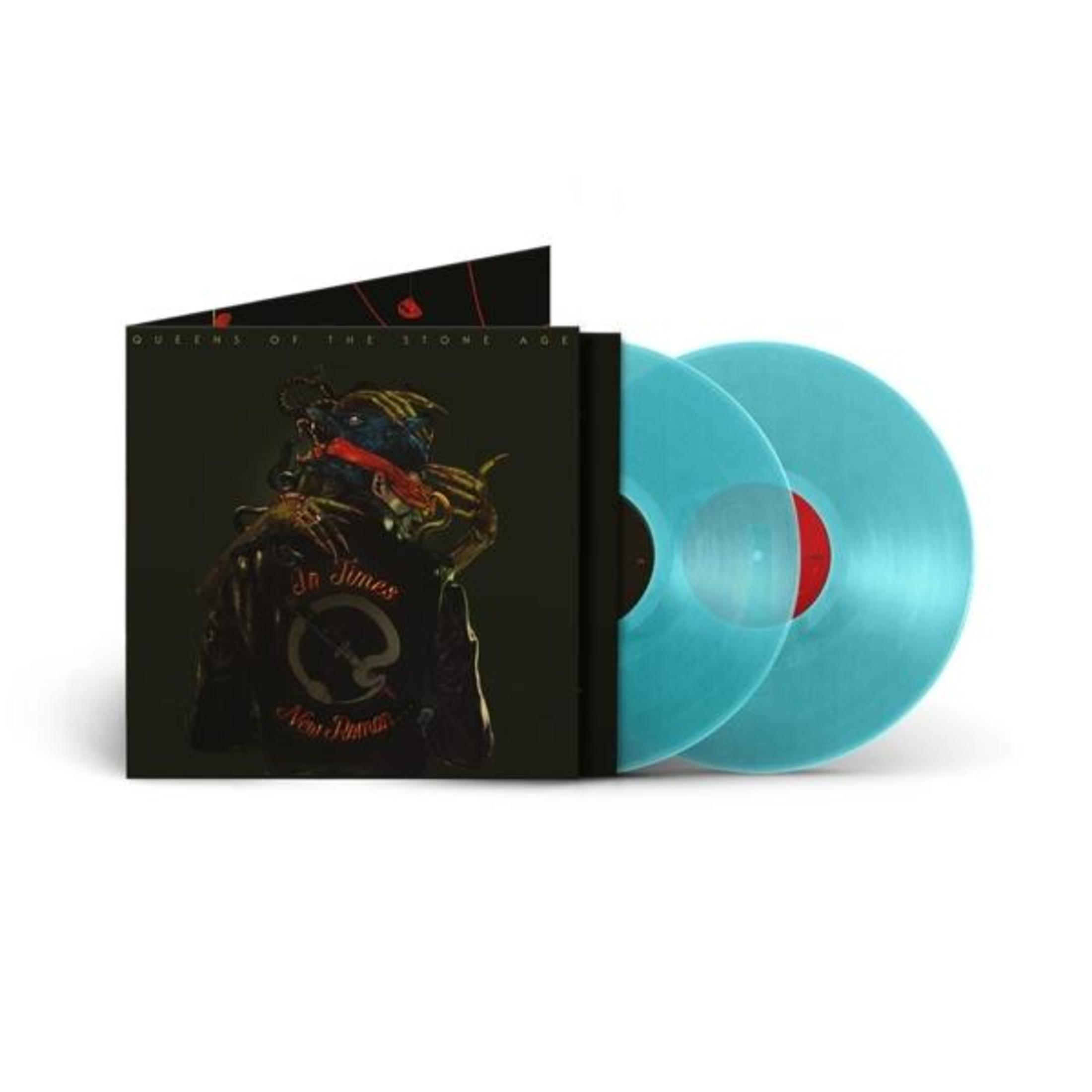 Album cover: Two blue vinyl records, cover with figure, black background, and white text.