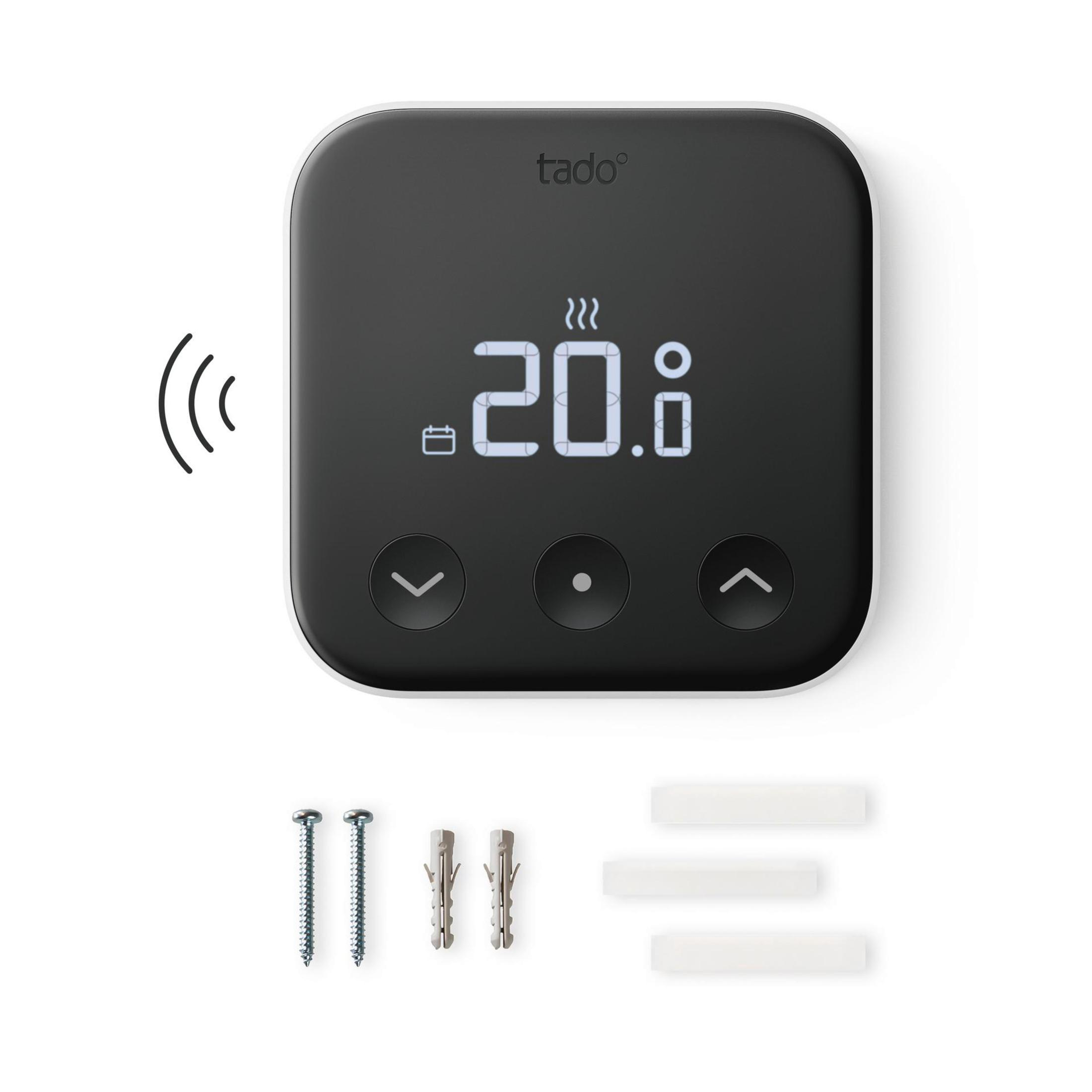 Black Tado thermostat. Shows 20 degrees. Screws and wall plugs below.