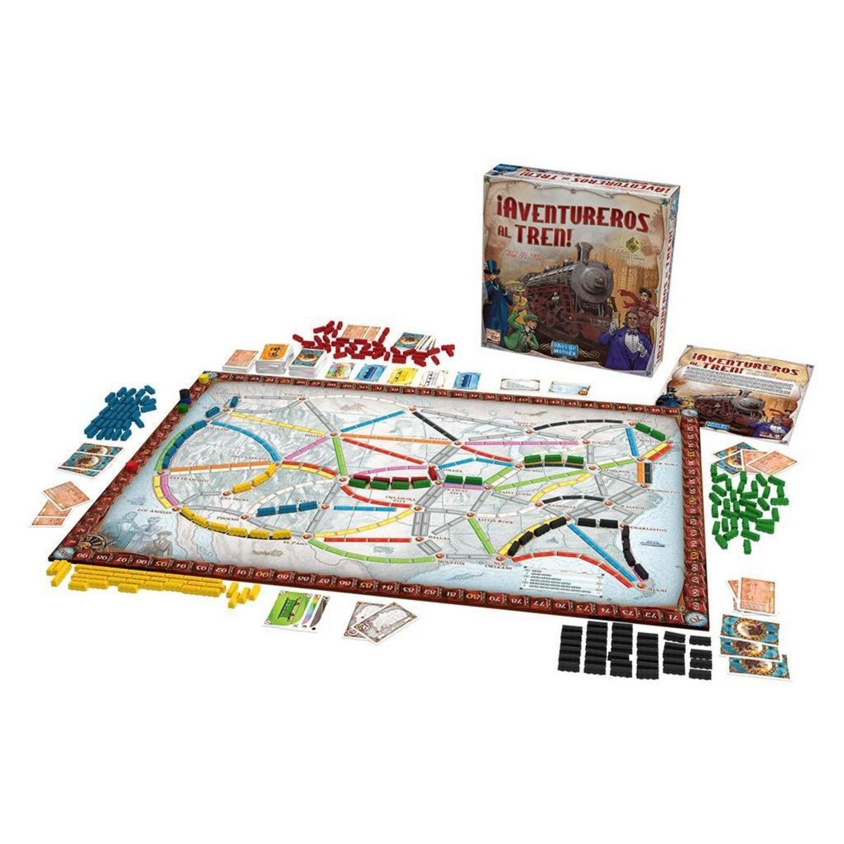 Una configuración de juego de mesa con mapa, piezas de tren, cartas y caja.