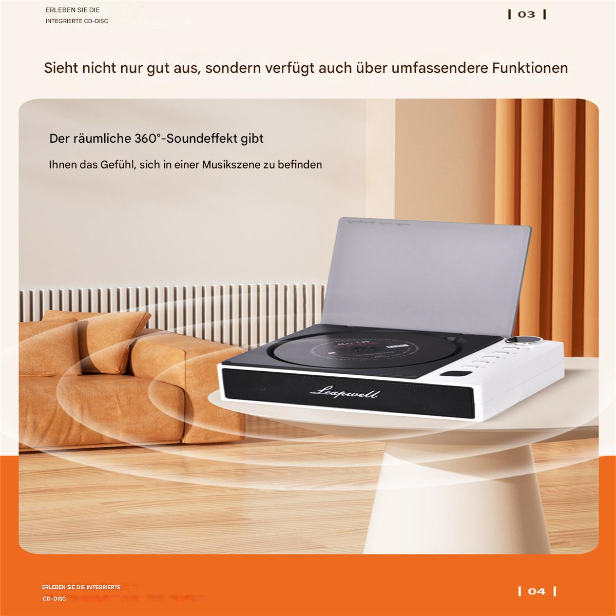 Ein weiß-schwarzer Plattenspieler mit einer Schallplatte und einer Abdeckung auf einem Tisch.
