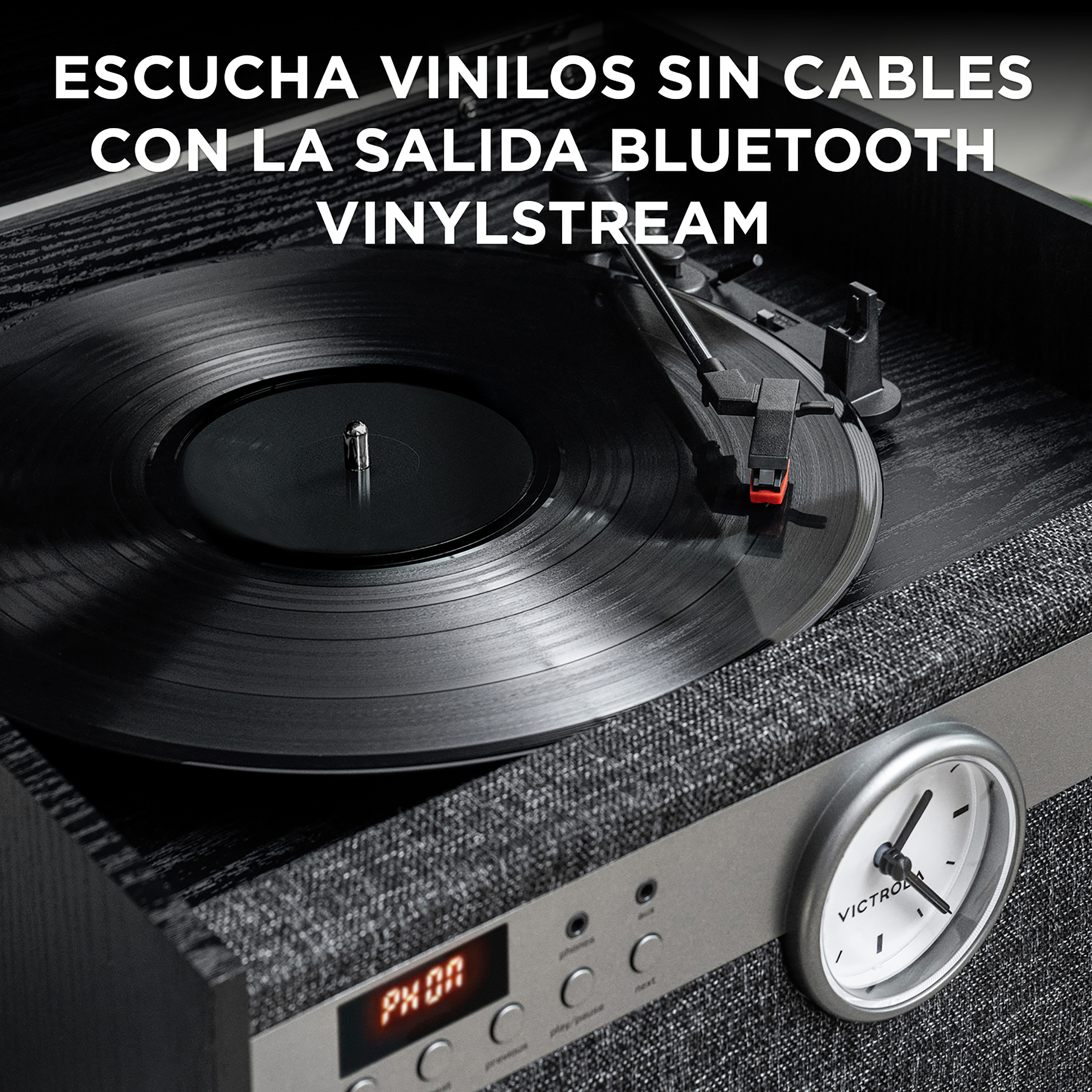 Tocadiscos reproduciendo un disco. Texto en español: Escucha vinilos sin cables. Negro y gris.