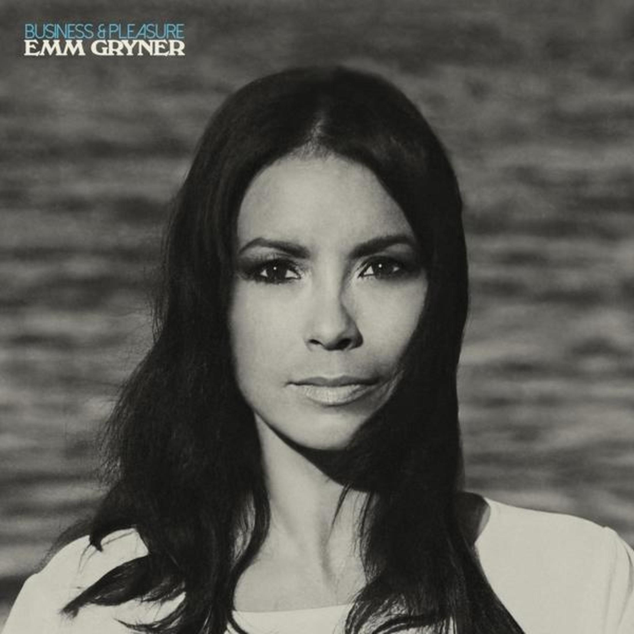 Copertina dell'album di Emm Gryner, il volto di una donna su uno sfondo sfocato, con testo.