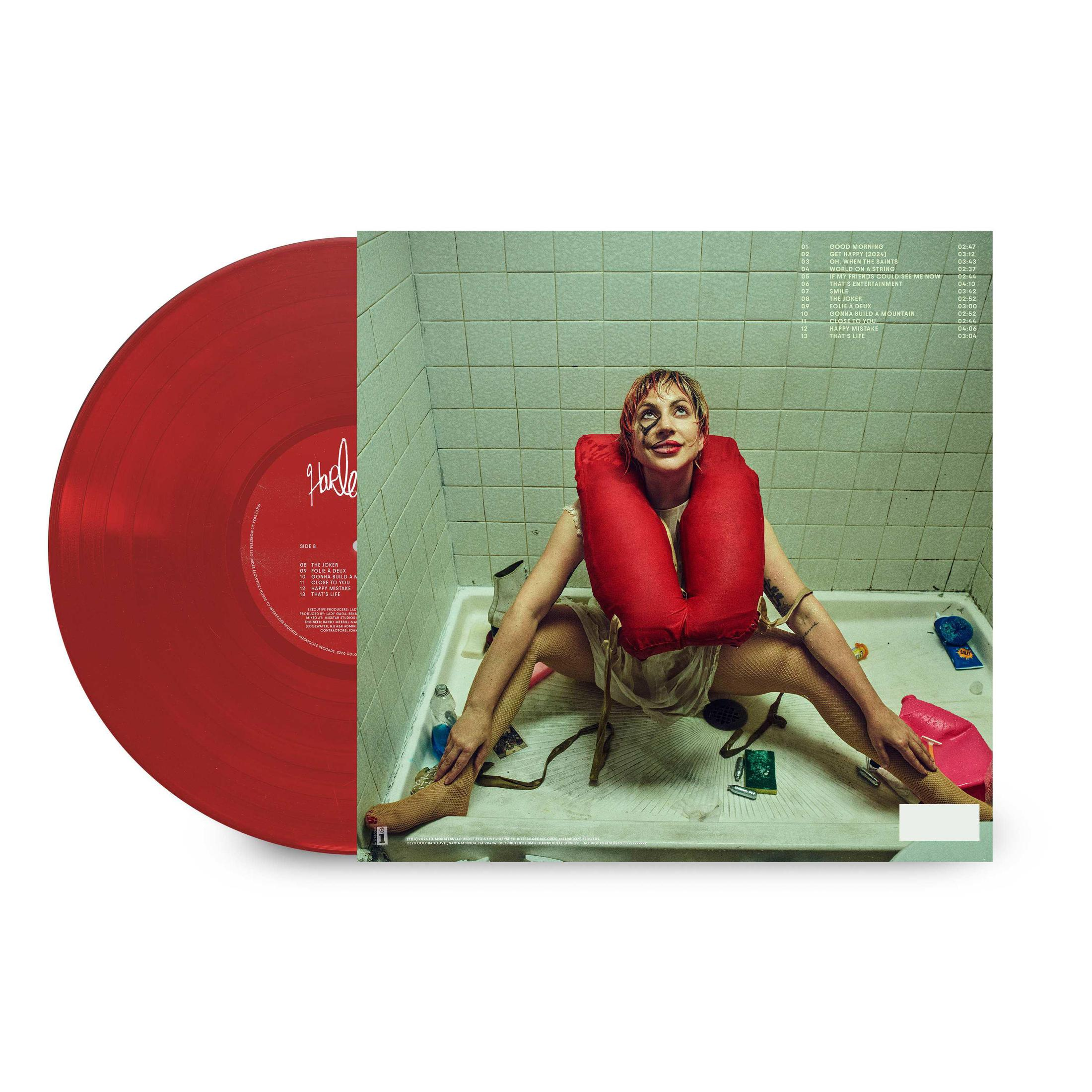 Vinilo rojo y portada del álbum con una mujer en la ducha con un salvavidas.