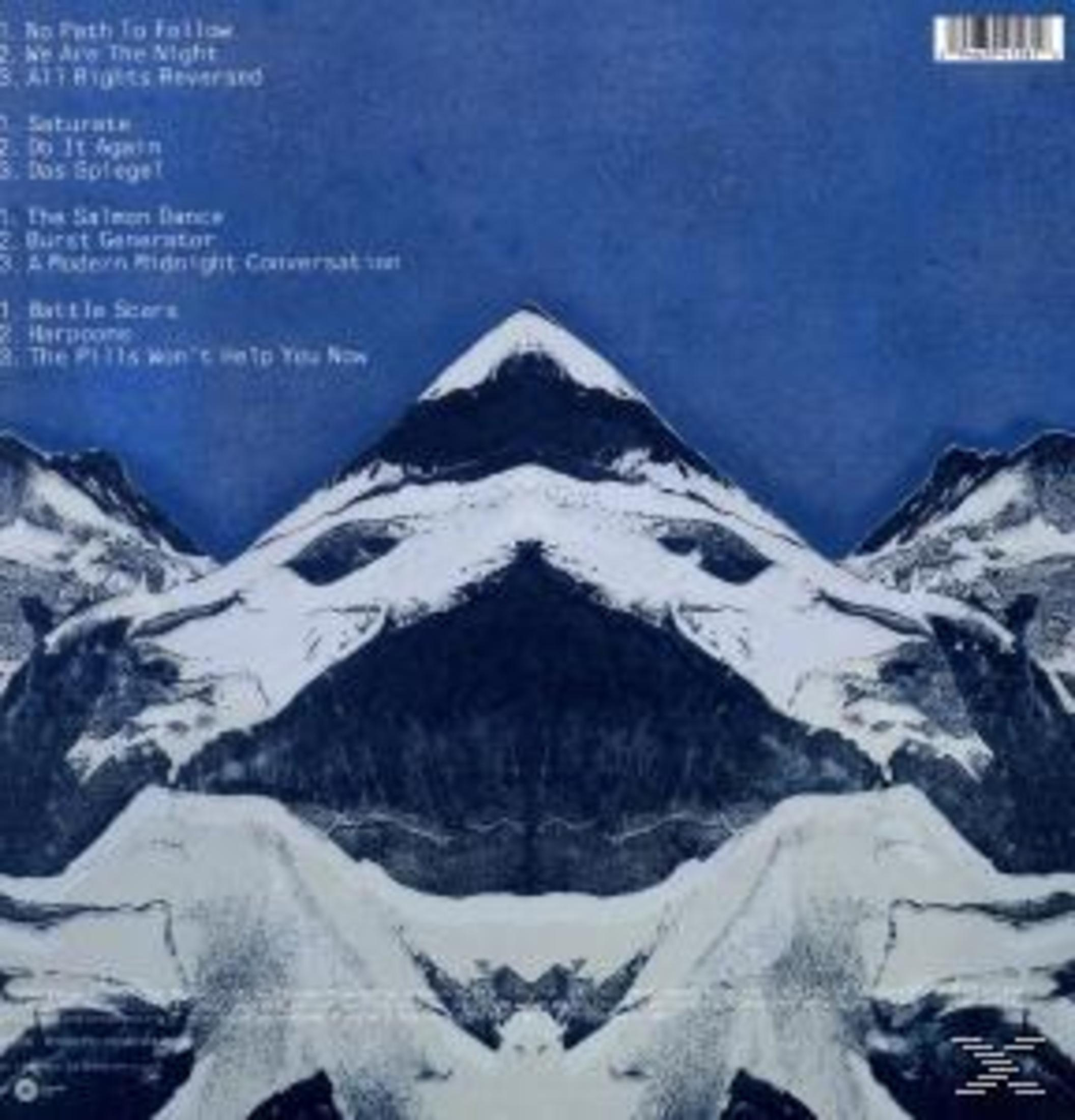 Copertina dell'album. Montagne innevate e un elenco di titoli di canzoni.