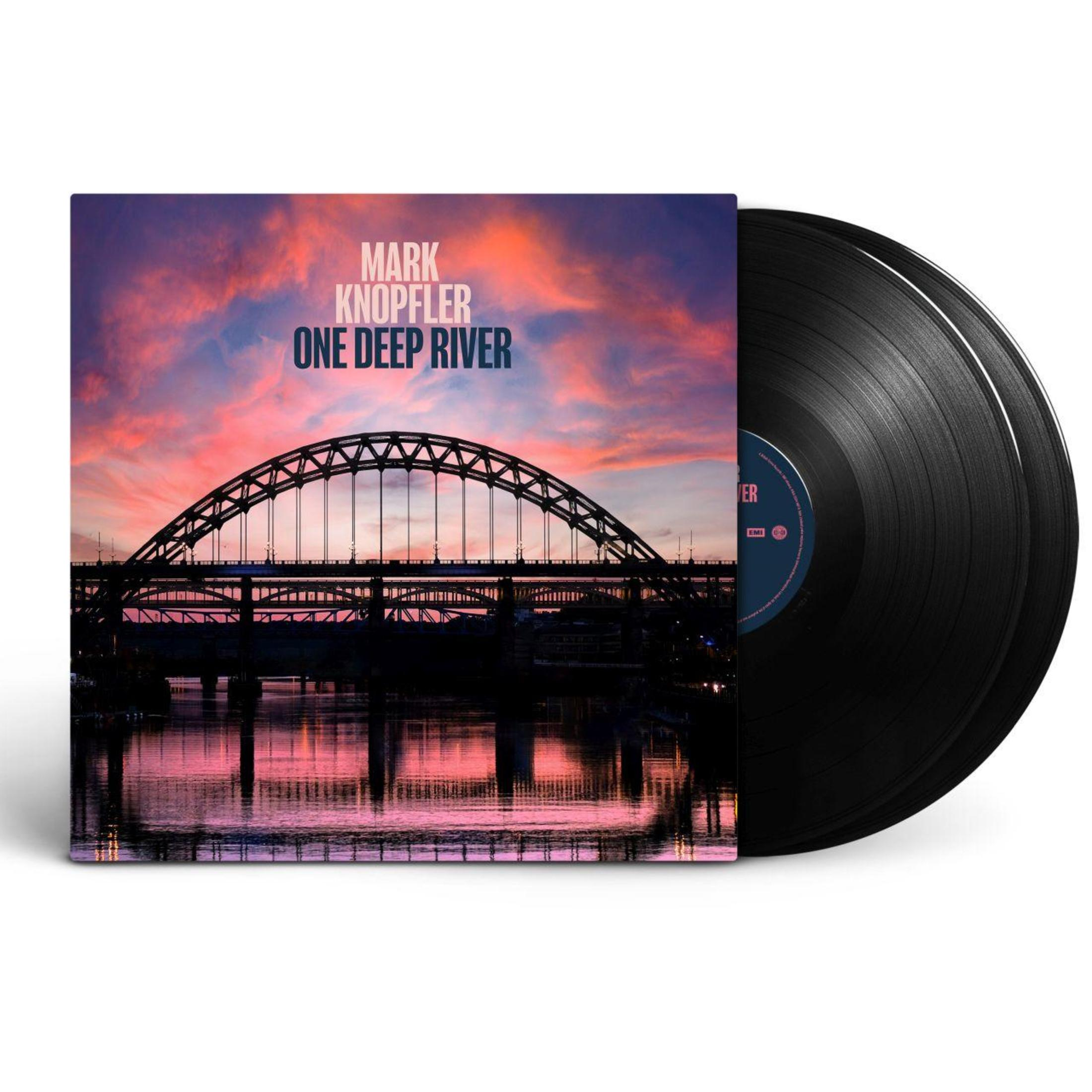An album cover, with a sunset over a bridge, and two black vinyl records on the right.