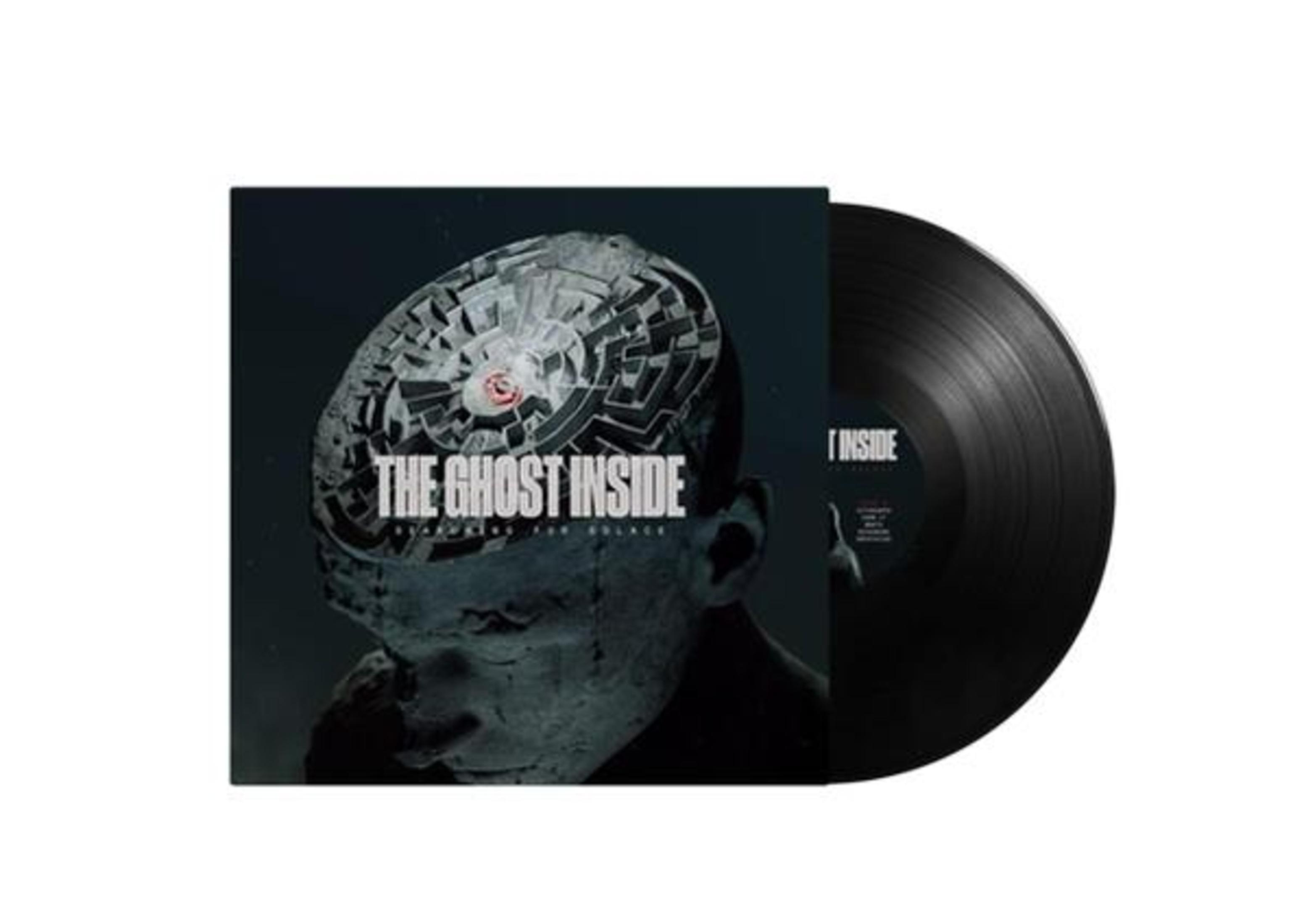 Copertina dell'album con grafica del cervello e disco in vinile, sfondo nero.