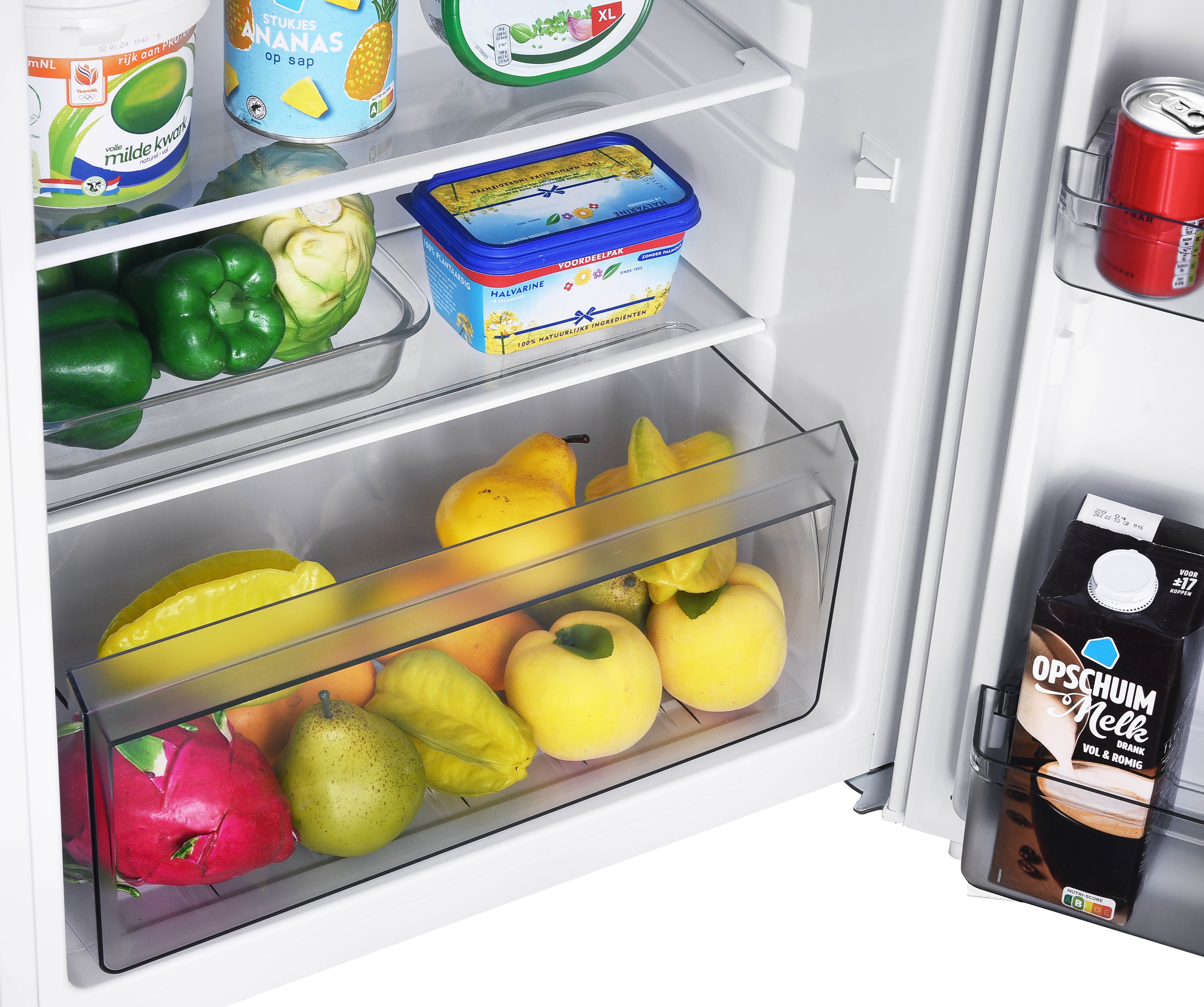 Refrigerator interior filled with fruits, vegetables, and packaged food items.