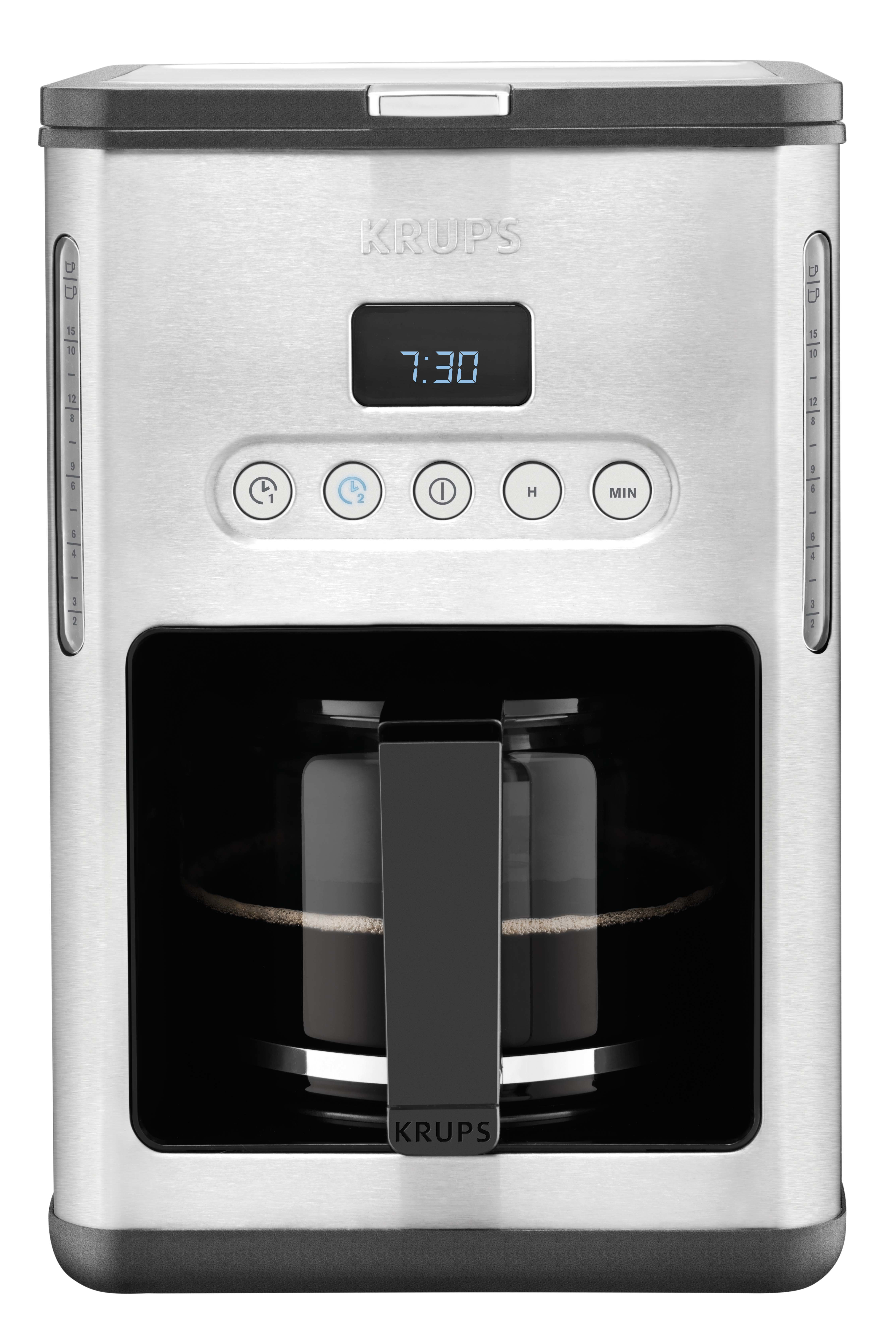Silber-schwarze Kaffeemaschine. Digitalanzeige zeigt 7:30. Knöpfe darunter. Schwarze Karaffe innen.