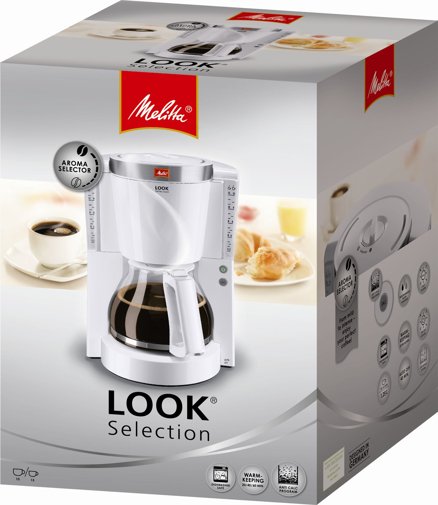 Una macchina da caffè Melitta bianca con una caraffa in vetro, su una grande scatola con immagini di caffè.