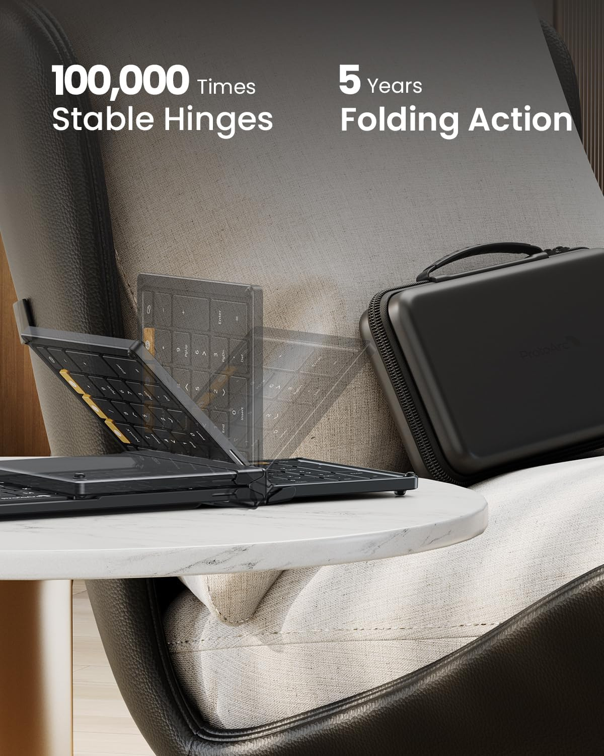 Black keyboard folds. A black case sits on a table, by a chair. Text states stable hinges.