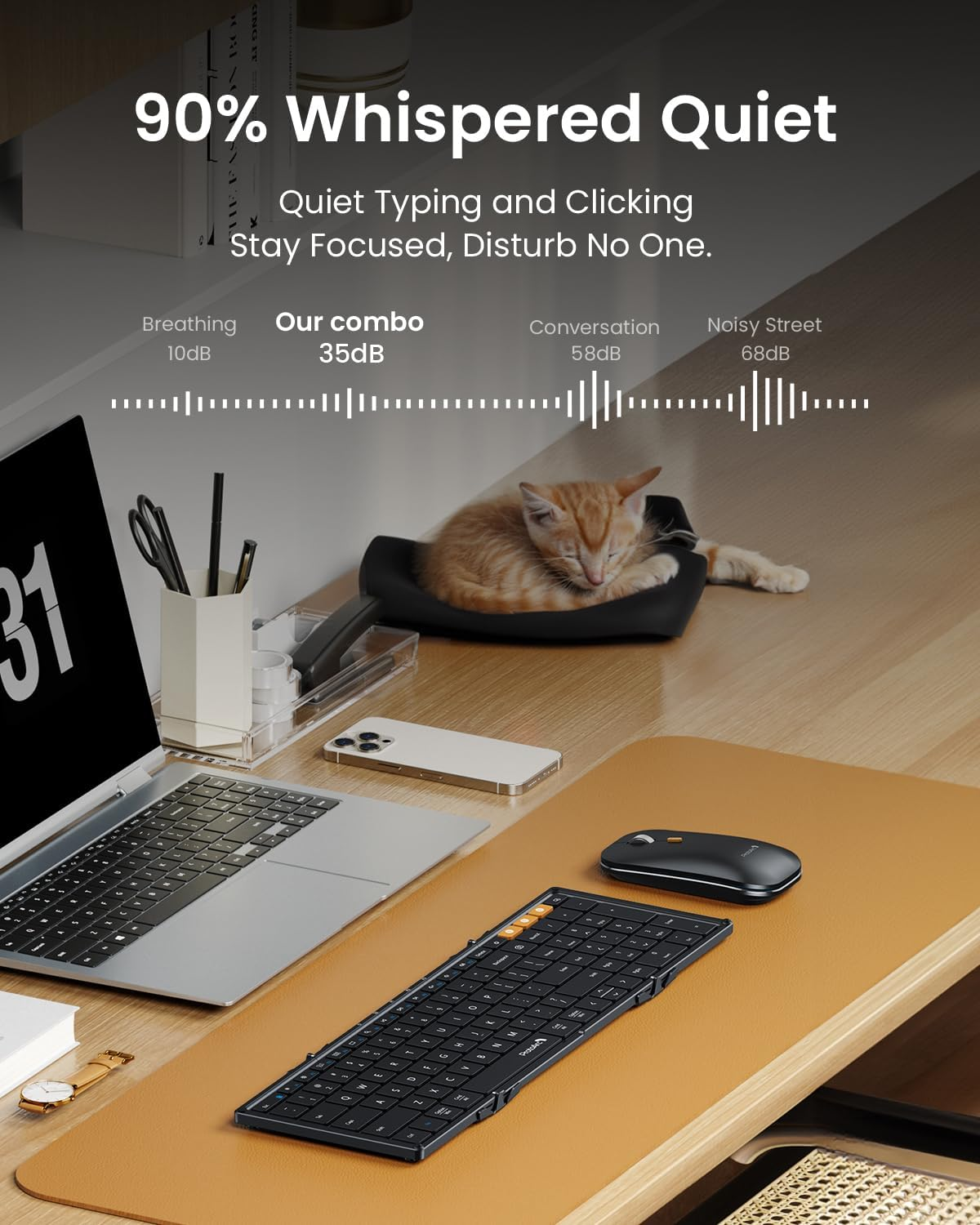 A keyboard, mouse, and laptop on a desk. Text shows noise levels: breathing, our combo, conversation, and noisy street.