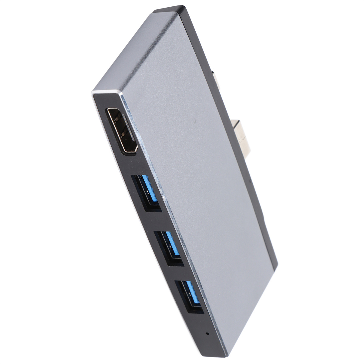 Silberner USB-Hub mit drei blauen USB-Anschlüssen und einem HDMI-Anschluss an der Seite.