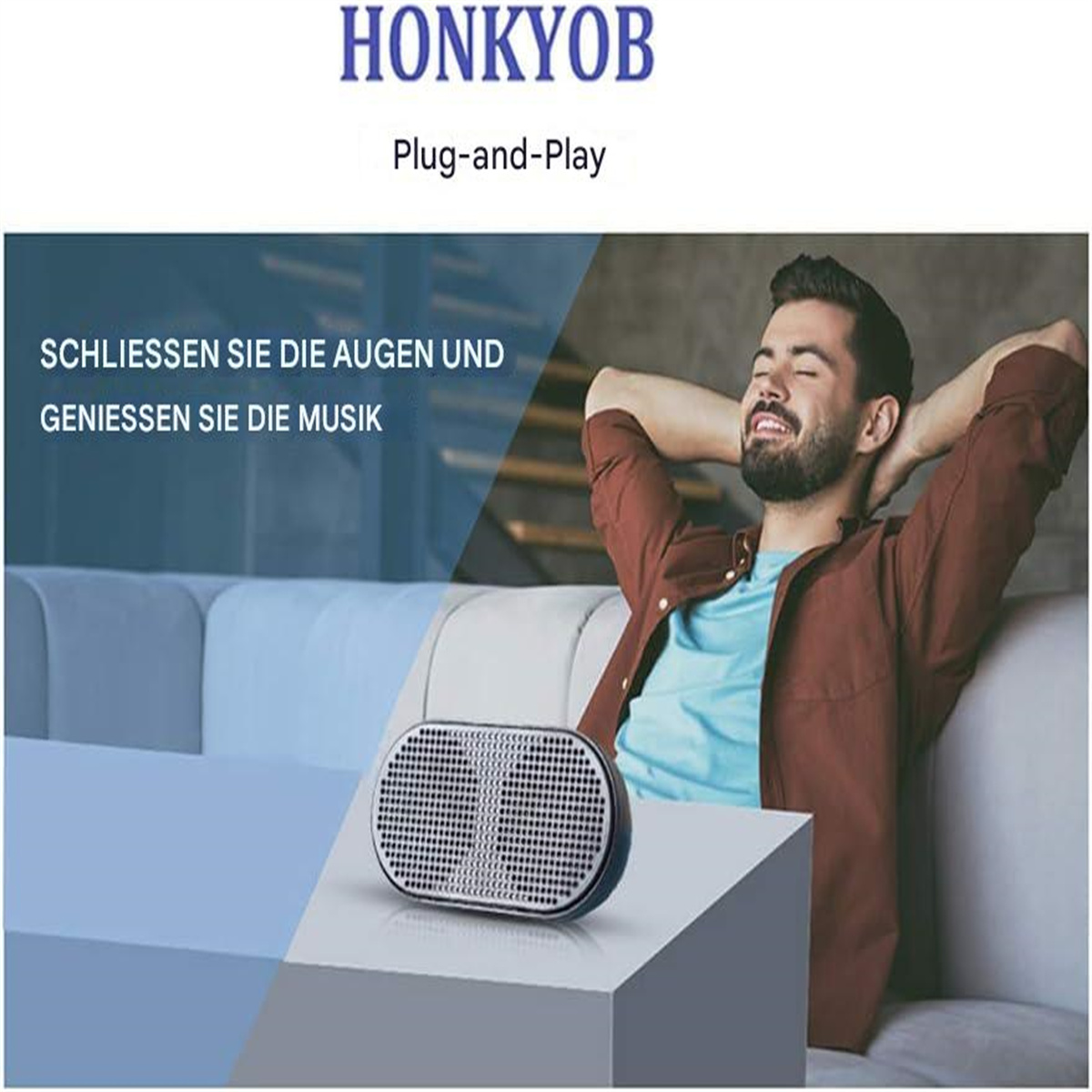 Ein Mann lächelt mit einem Lautsprecher auf einem Tisch. Das Wort HONKYOB und Text stehen oben.